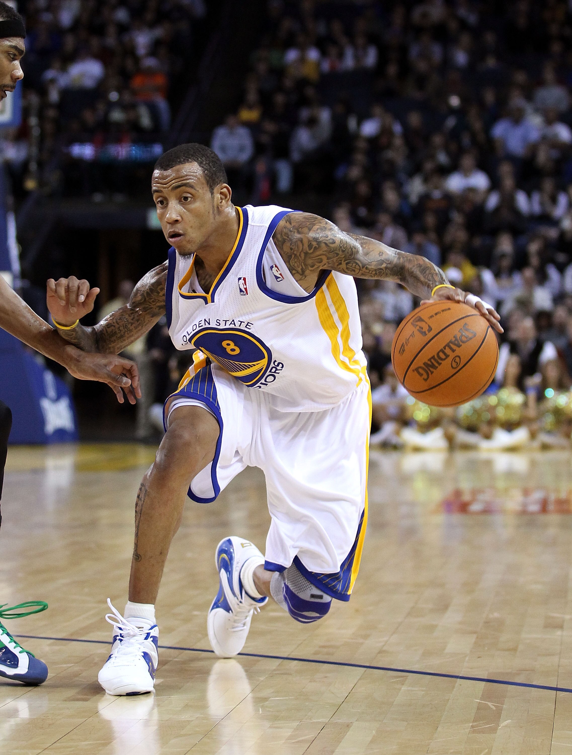 OAKLAND, CA - DECEMBER 14:  Monta Ellis #8 of the Golden State Warriors in action against the Minnesota Timberwolves at Oracle Arena on December 14, 2010 in Oakland, California.  NOTE TO USER: User expressly acknowledges and agrees that, by downloading an