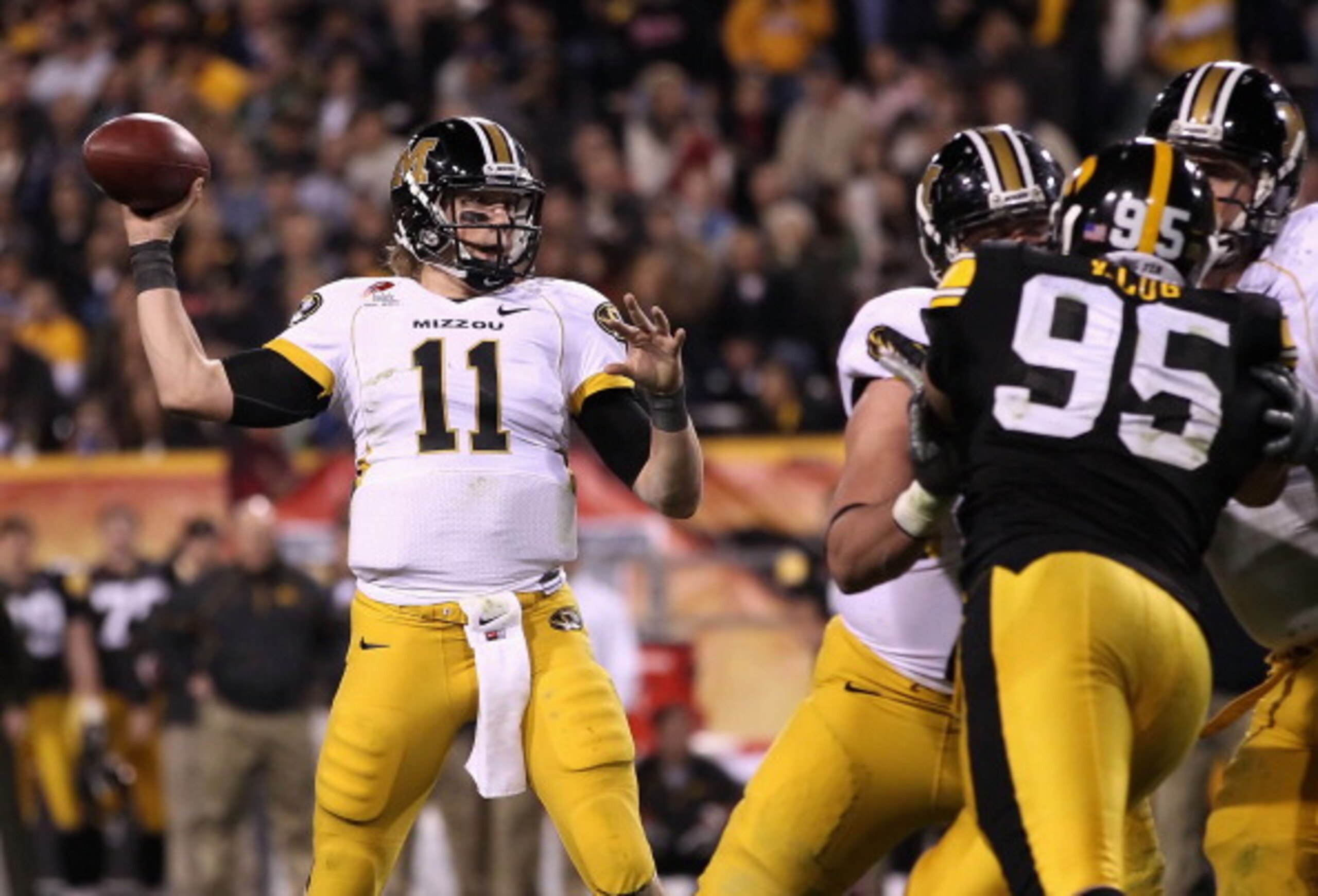 TEMPE, AZ - DECEMBER 28:  Quarterback Blaine Gabbert #11 of the Missouri Tigers drops back to pass during the Insight Bowl against the Iowa Hawkeyes  at Sun Devil Stadium on December 28, 2010 in Tempe, Arizona.  The Hawkeyes defeated the Tigers 27-24.  (P