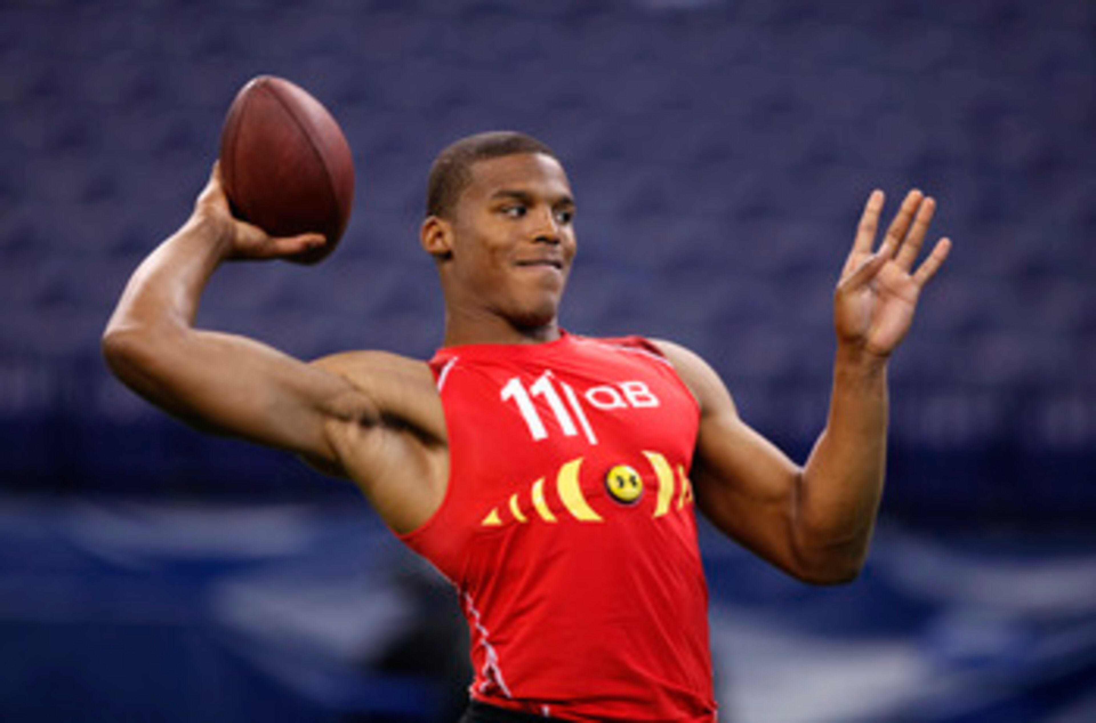 INDIANAPOLIS, IN - FEBRUARY 27: Cam Newton passes the ball during the 2011 NFL Scouting Combine at Lucas Oil Stadium on February 27, 2011 in Indianapolis, Indiana. (Photo by Joe Robbins/Getty Images)