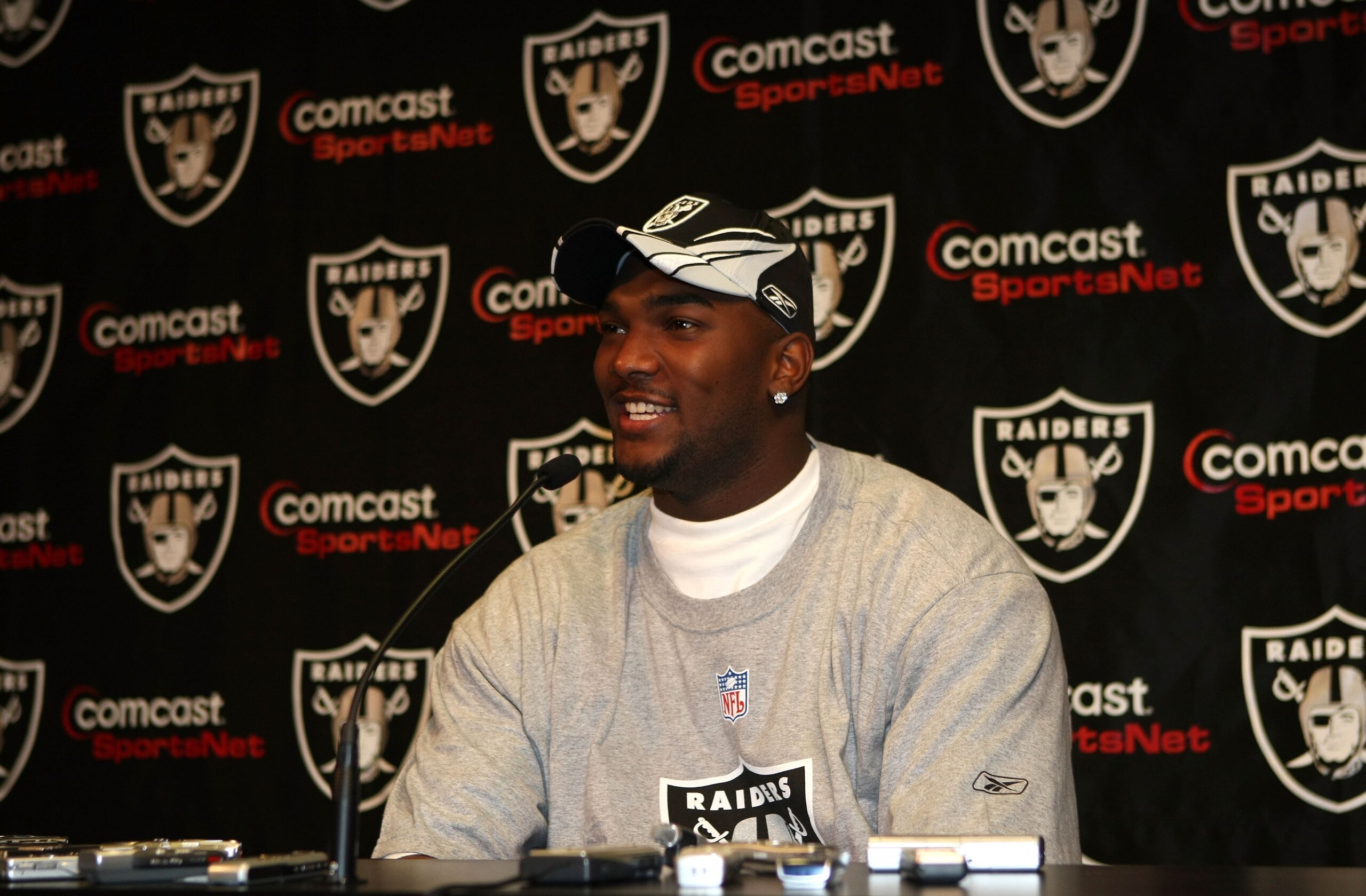 ALAMEDA, CA - SEPTEMBER 12:  First overall draft pick JaMarcus Russell speaks during a press conference after signing a contract with the Oakland Raiders on September 12, 2007 at the Raiders Training Facility in Alameda, California.  (Photo by Jed Jacobso