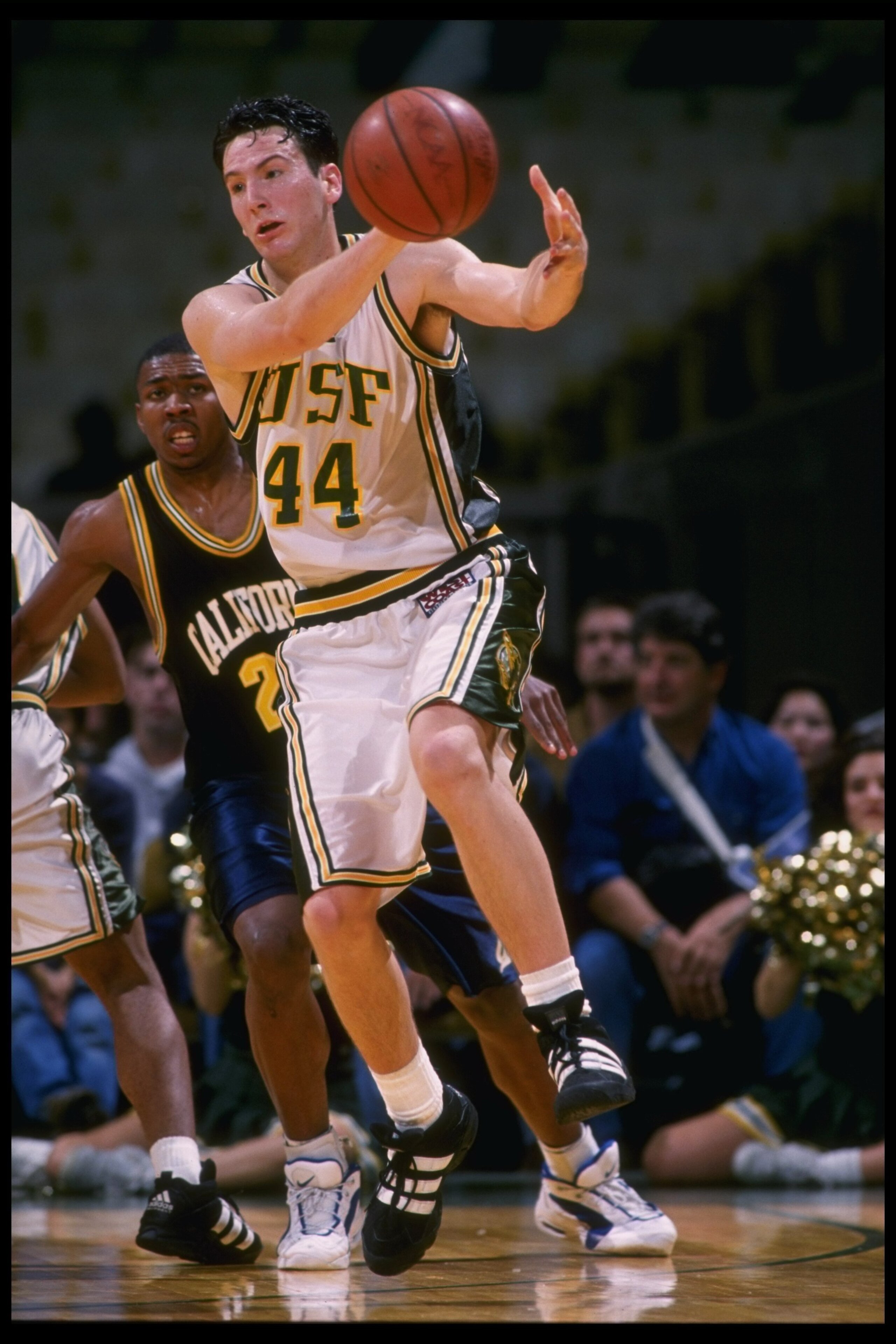 5 Dec 1995:  Forward John Duggan of the University of San Francisco Dons moves the ball against the California Bears during a game played at Memorial Gymnasium in San Francisco, California.  The Bears won the game, 83-70. Mandatory Credit: Otto Greule/All