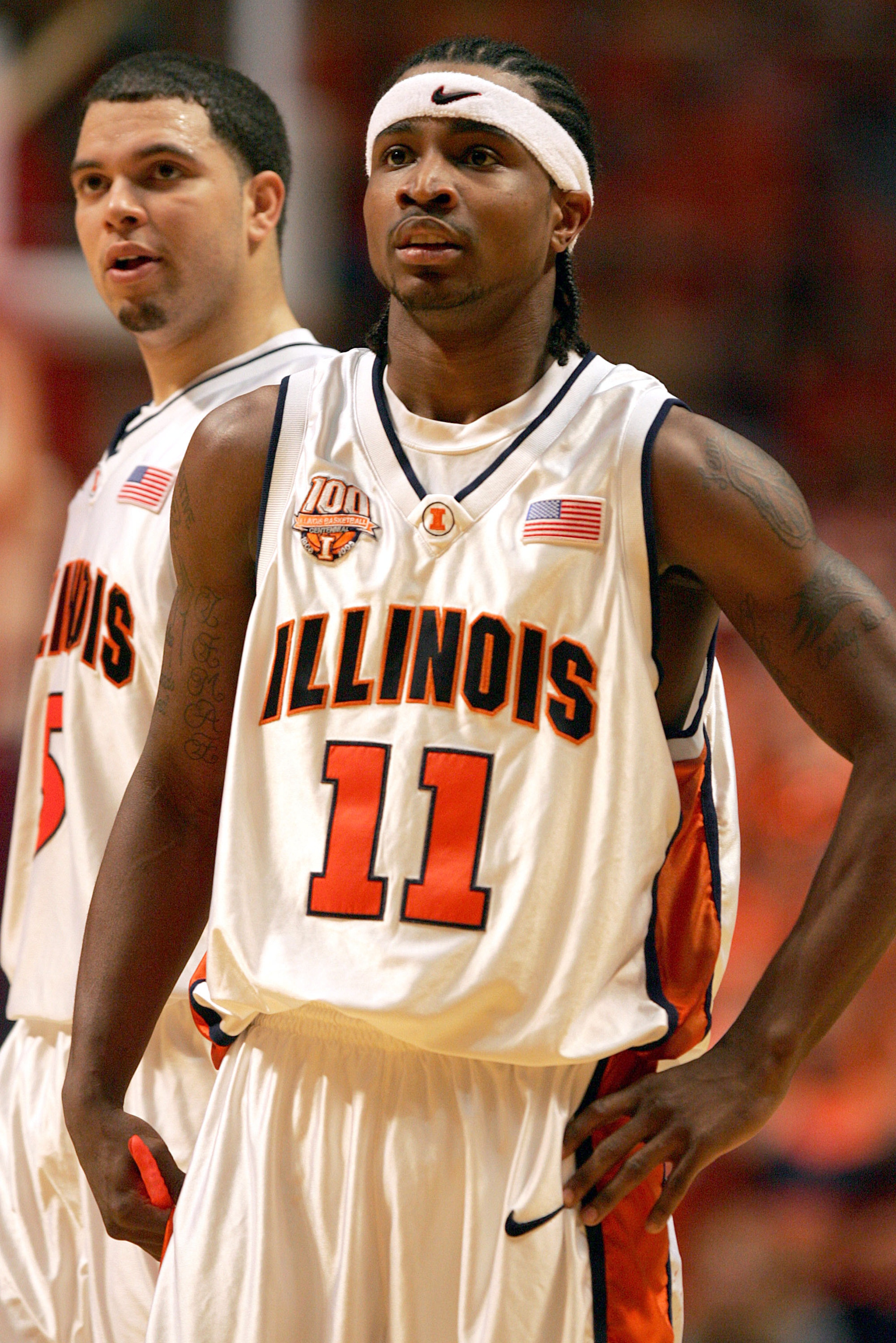 CHAMPAIGN, IL - FEBRUARY 12: Dee Brown #11 and Deron Williams #5 of the Illinois Fighting Illini wait for a member of the Wisconsin Badgers to shoot a free-throw on February 12, 2005 at the Assembly Hall at the University of Illinois in Champaign, Illinoi