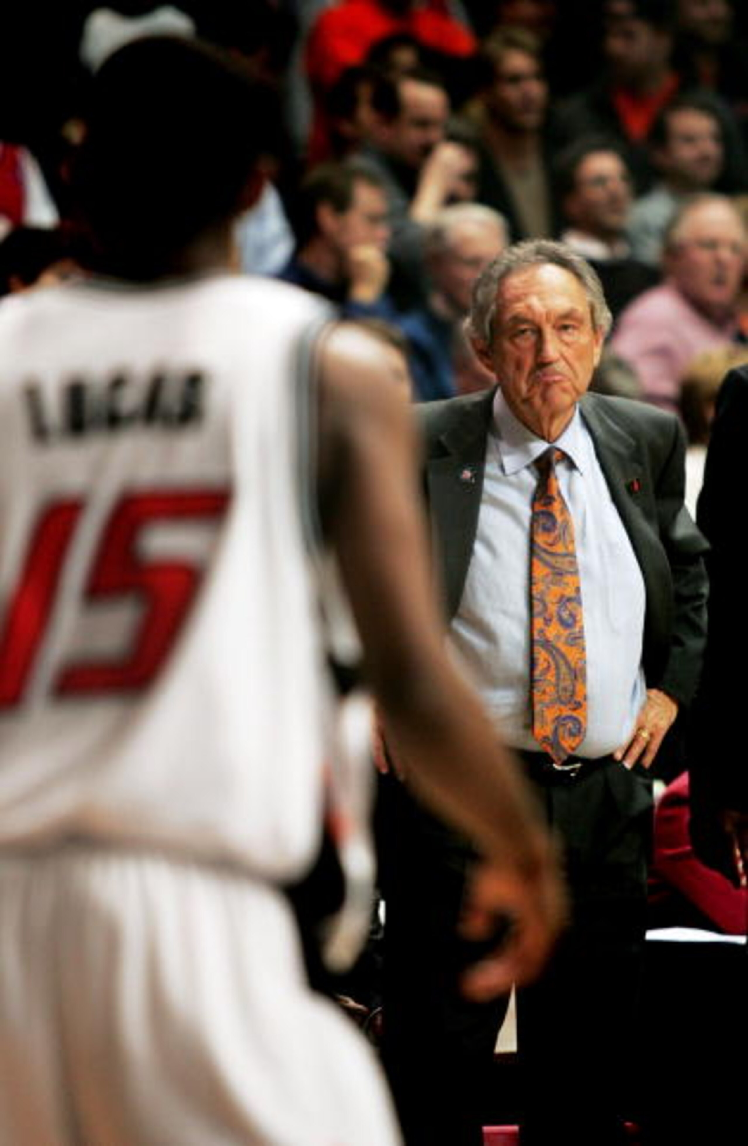 CHICAGO - MARCH 24:  Head coach Eddie Sutton of the Oklahoma State Cowboys looks toward John Lucas #15 after Lucas just missed a game winning shot against the Arizona Wildcats in game two of the Chicago Regional in the NCAA Division I Men's Basketball Cha