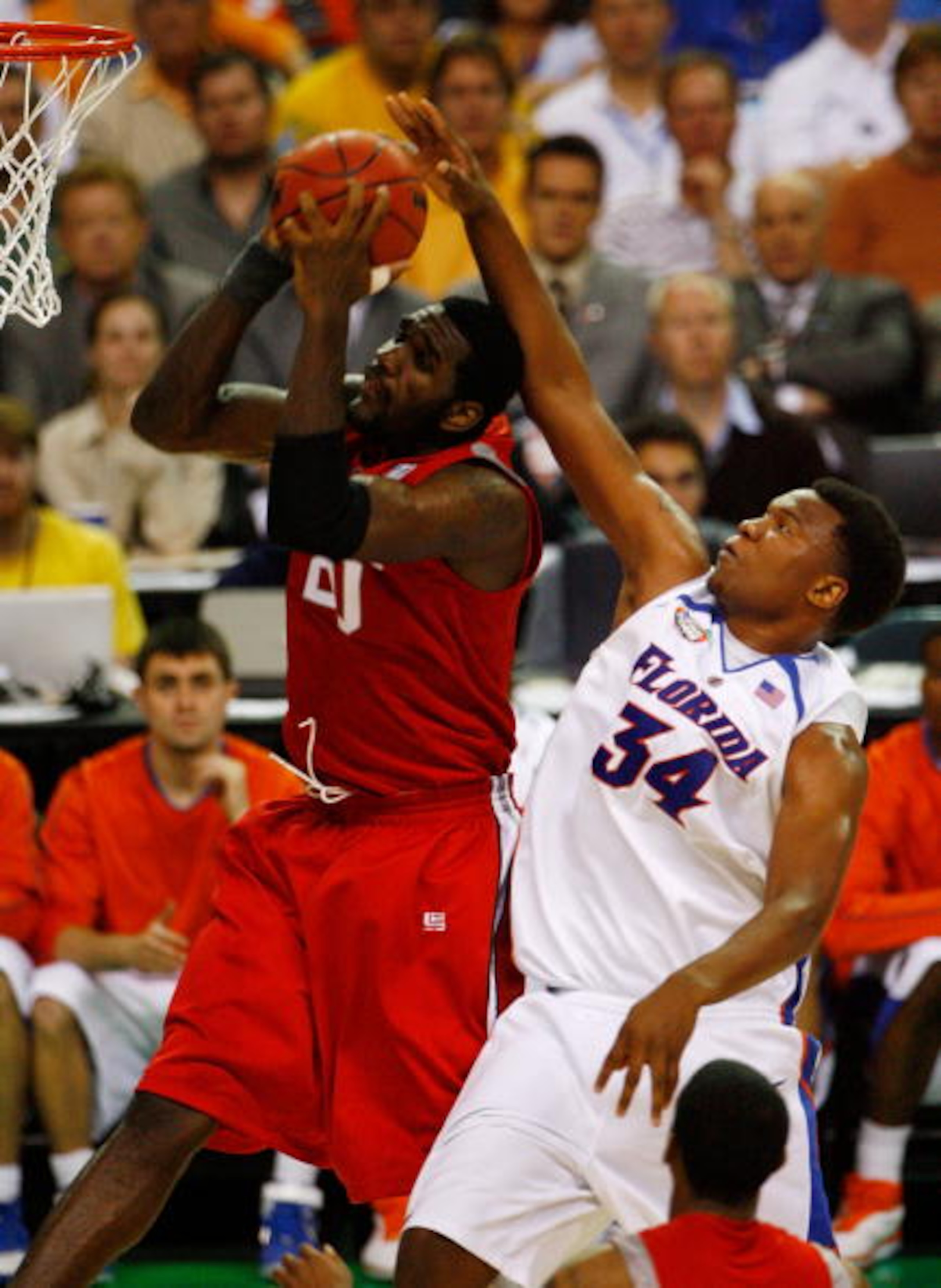 ATLANTA - APRIL 02:  Greg Oden #20 of the Ohio State Buckeyes grabs a rebound against  Marreese Speights #34 of the Florida Gators in the NCAA Men's Basketball Championship game at the Georgia Dome on April 2, 2007 in Atlanta, Georgia.  (Photo by Win McNa