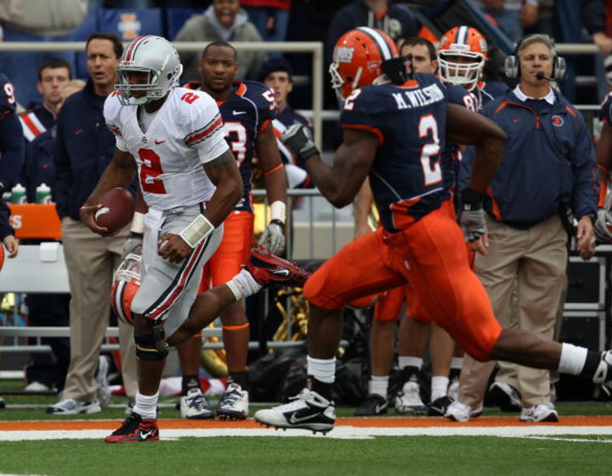 CHAMPAIGN, IL - OCTOBER 02: Terrelle Pryor #2 of the Ohio State Buckeyes runs for a first down as Martez Wilson #2 of the Illinois Fighting Illini pursues at Memorial Stadium on October 2, 2010 in Champaign, Illinois. Ohio State defeated Illinois 24-13. ( CHAMPAIGN, IL - OCTOBER 02: Terrelle Pryor #2 of the Ohio State Buckeyes runs for a first down as Martez Wilson #2 of the Illinois Fighting Illini pursues at Memorial Stadium on October 2, 2010 in Champaign, Illinois. Ohio State defeated Illinois 24-13. (