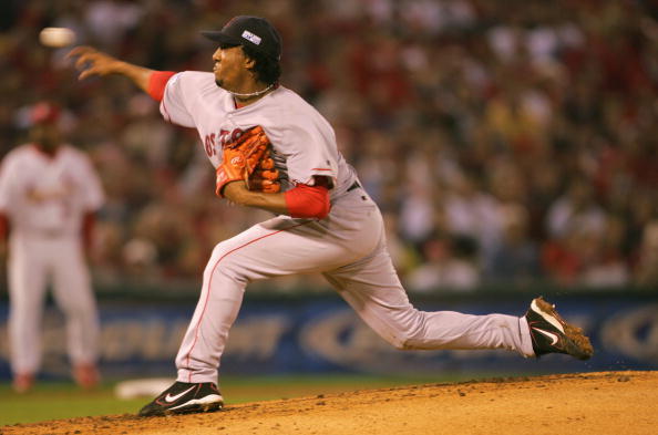 ST LOUIS - OCTOBER 26:  Pitcher Pedro Martinez #45 of the Boston Red Sox throws a pitch in the fourth inning against  the St. Louis Cardinals during game three of the World Series on October 26, 2004 at Busch Stadium in St. Louis, Missouri. (Photo by Elsa