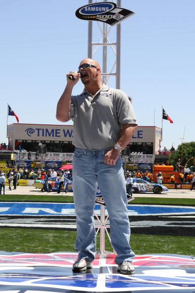 FORT WORTH, TX - APRIL 15: Honorary Starter, WWE wrestler 'Stone Cold' Steve Austin, gives the command for drivers to start their engines prior to the NASCAR Nextel Cup Series Samsung 500 at Texas Motor Speedway on April 15, 2007 in Fort Worth, Texas.  (P