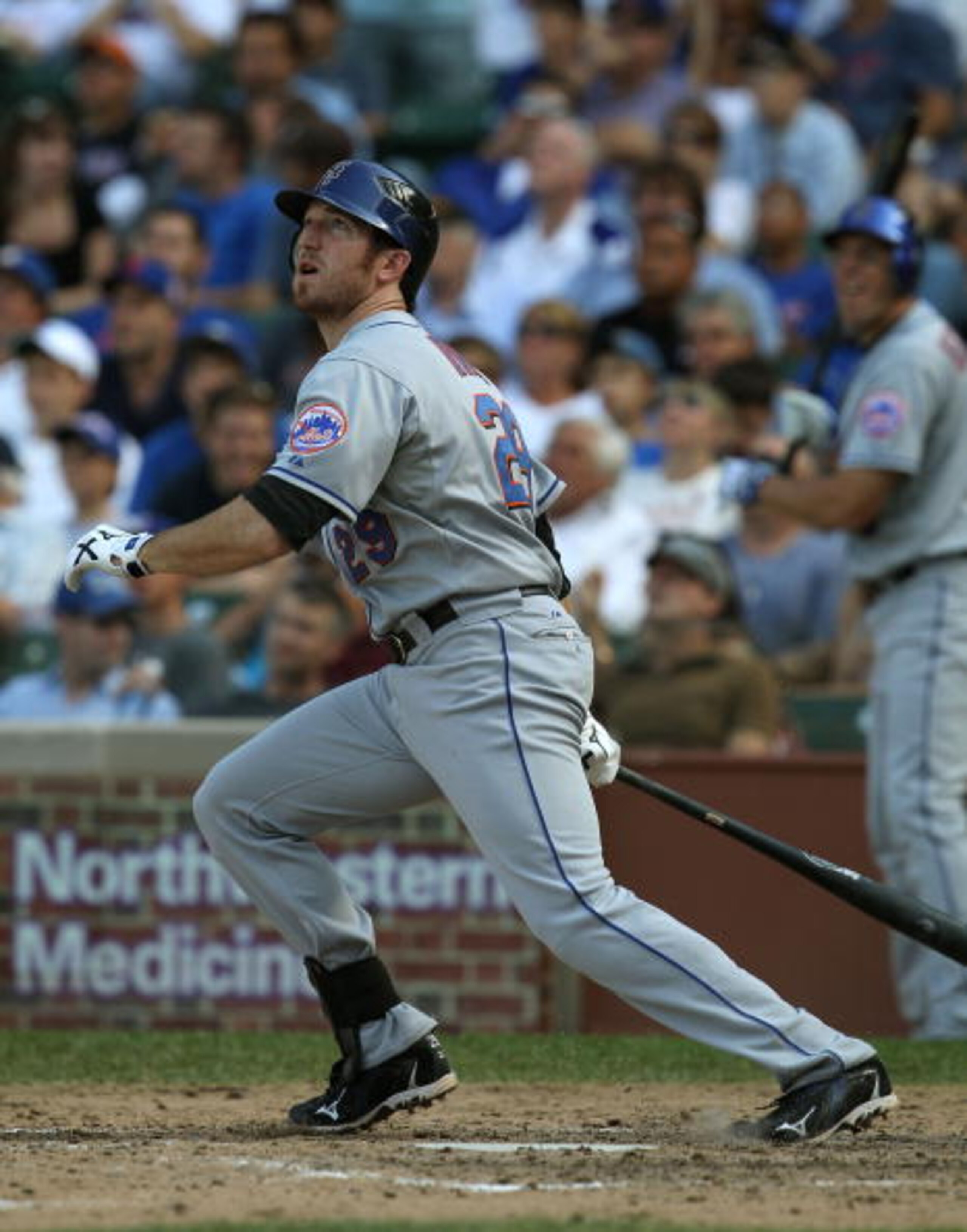 CHICAGO - SEPTEMBER 05: Ike Davis #29 of the New York Mets watches the flight of his two run home run in the 8th inning against the Chicago Cubs at Wrigley Field on September 5, 2010 in Chicago, Illinois. (Photo by Jonathan Daniel/Getty Images) CHICAGO - SEPTEMBER 05: Ike Davis #29 of the New York Mets watches the flight of his two run home run in the 8th inning against the Chicago Cubs at Wrigley Field on September 5, 2010 in Chicago, Illinois. (Photo by Jonathan Daniel/Getty Images)
