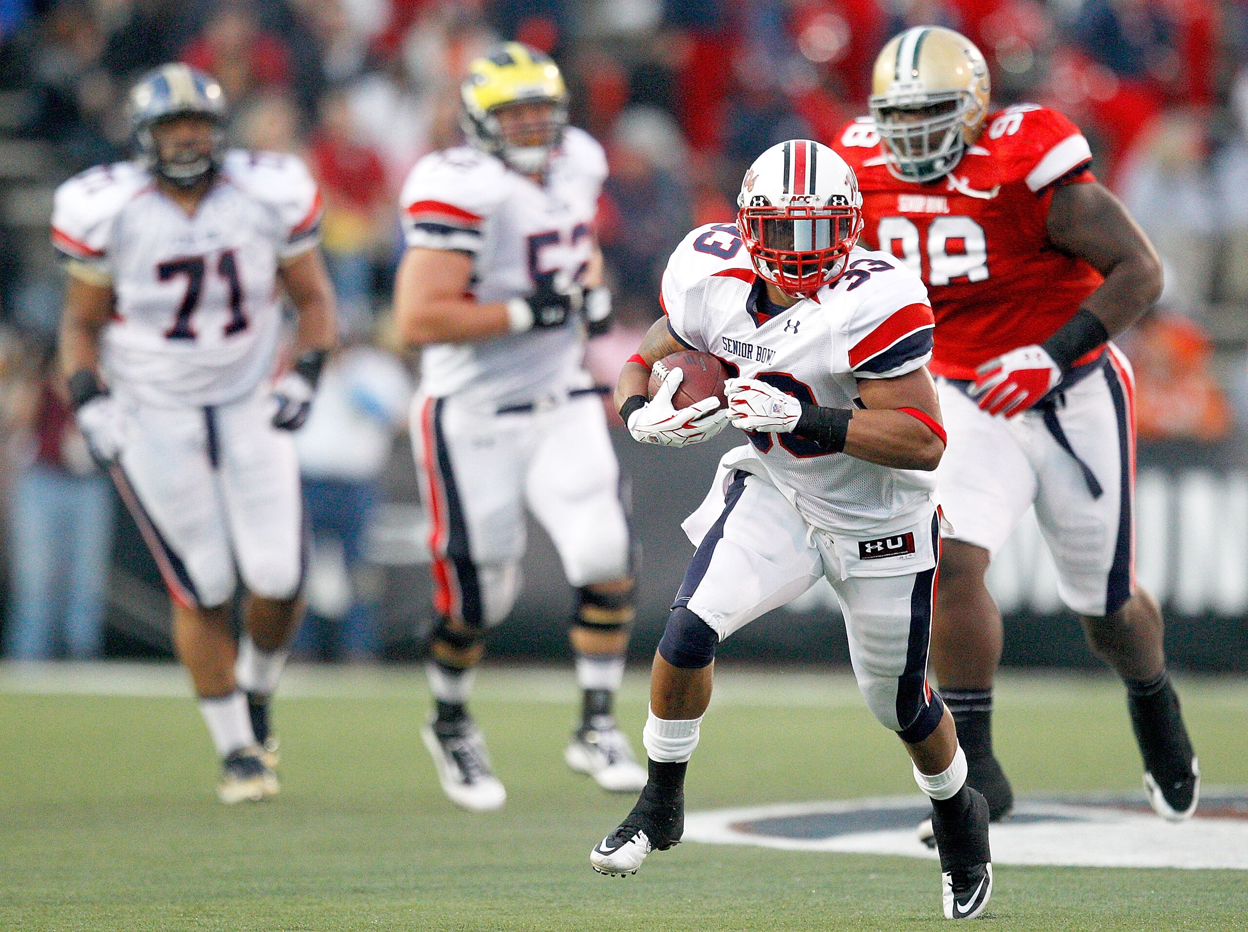 MOBILE, AL - JANUARY 29: Running back Da'Rel Scott #33 of the North Team rushes for a first down against the South during third quarter of the Under Armour Senior Bowl on January 29, 2011 at Ladd-Pebbles Stadium in Mobile, Alabama.  (Photo by Sean Gardner