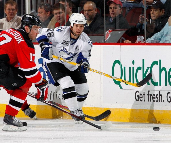 NEWARK, NJ - MARCH 02:  Martin St. Louis #26 of the Tampa Bay Lightning skates during an NHL hockey game against the New Jersey Devils at the Prudential Center on March 2, 2011 in Newark, New Jersey.  (Photo by Paul Bereswill/Getty Images)