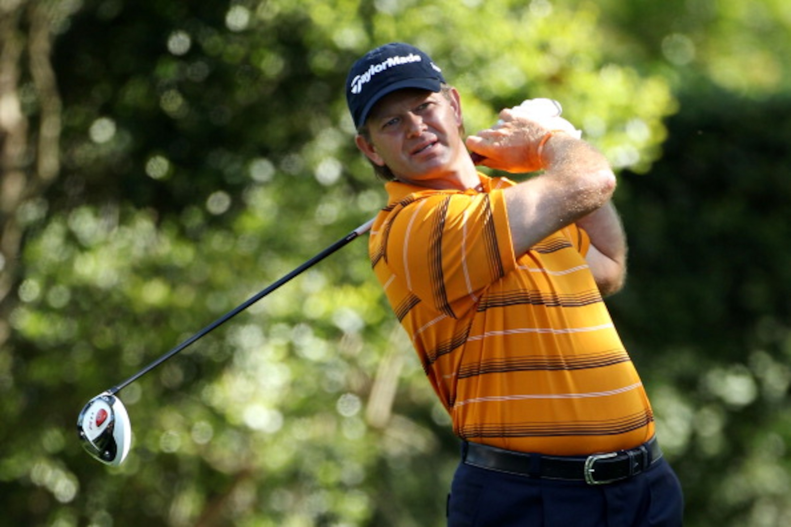 AUGUSTA, GA - APRIL 07:  Retief Goosen of South Africa hits his tee shot on the second hole during the first round of the 2011 Masters Tournament at Augusta National Golf Club on April 7, 2011 in Augusta, Georgia.  (Photo by Andrew Redington/Getty Images)