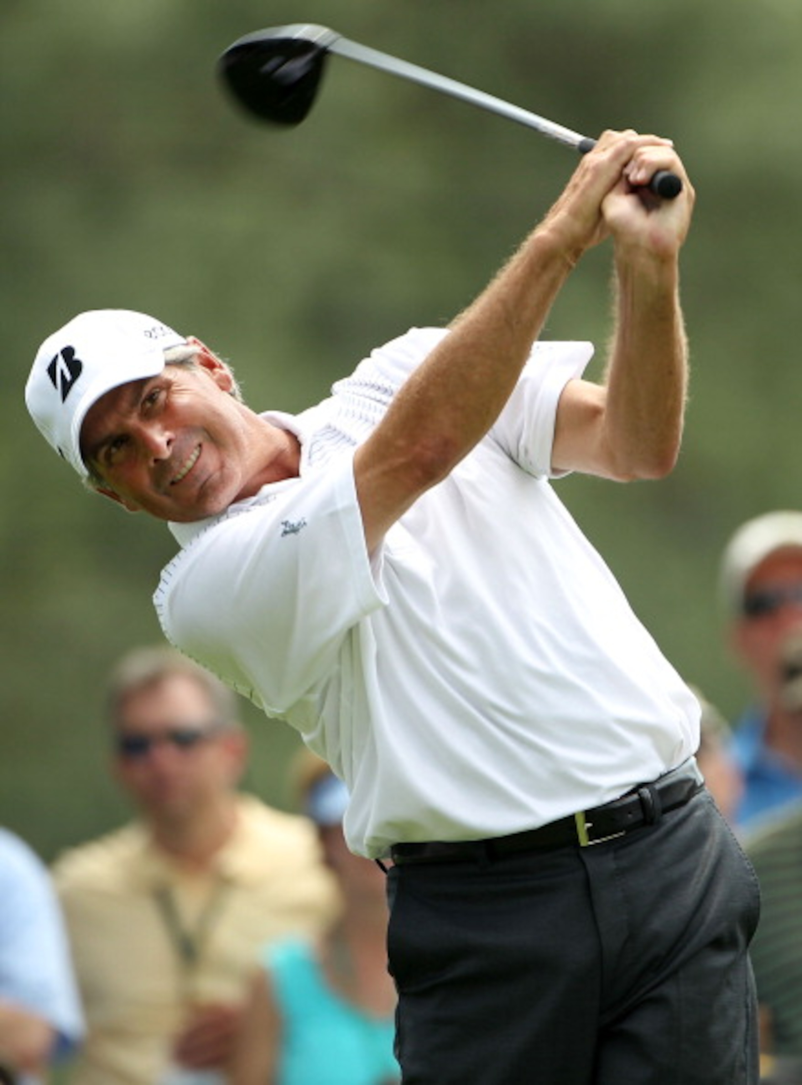 AUGUSTA, GA - APRIL 08:  Fred Couples watches his tee shot on the 18th hole during the second round of the 2011 Masters Tournament at Augusta National Golf Club on April 8, 2011 in Augusta, Georgia.  (Photo by Jamie Squire/Getty Images)