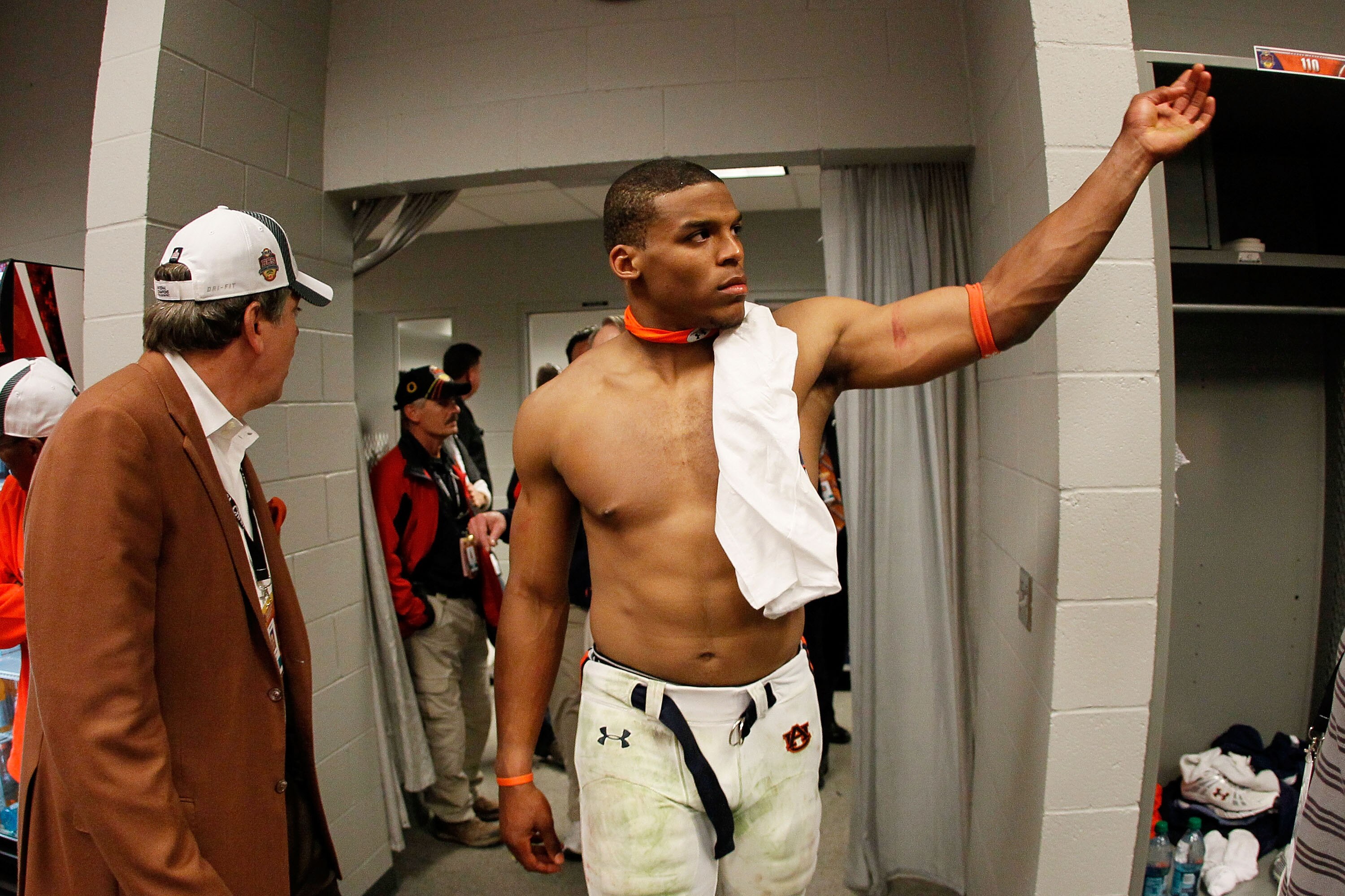 GLENDALE, AZ - JANUARY 10:  Quarterback Cameron Newton #2 of the Auburn Tigers celebrates their 22-19 victory in the locker room after defeating the Oregon Ducks in the Tostitos BCS National Championship Game at University of Phoenix Stadium on January 10