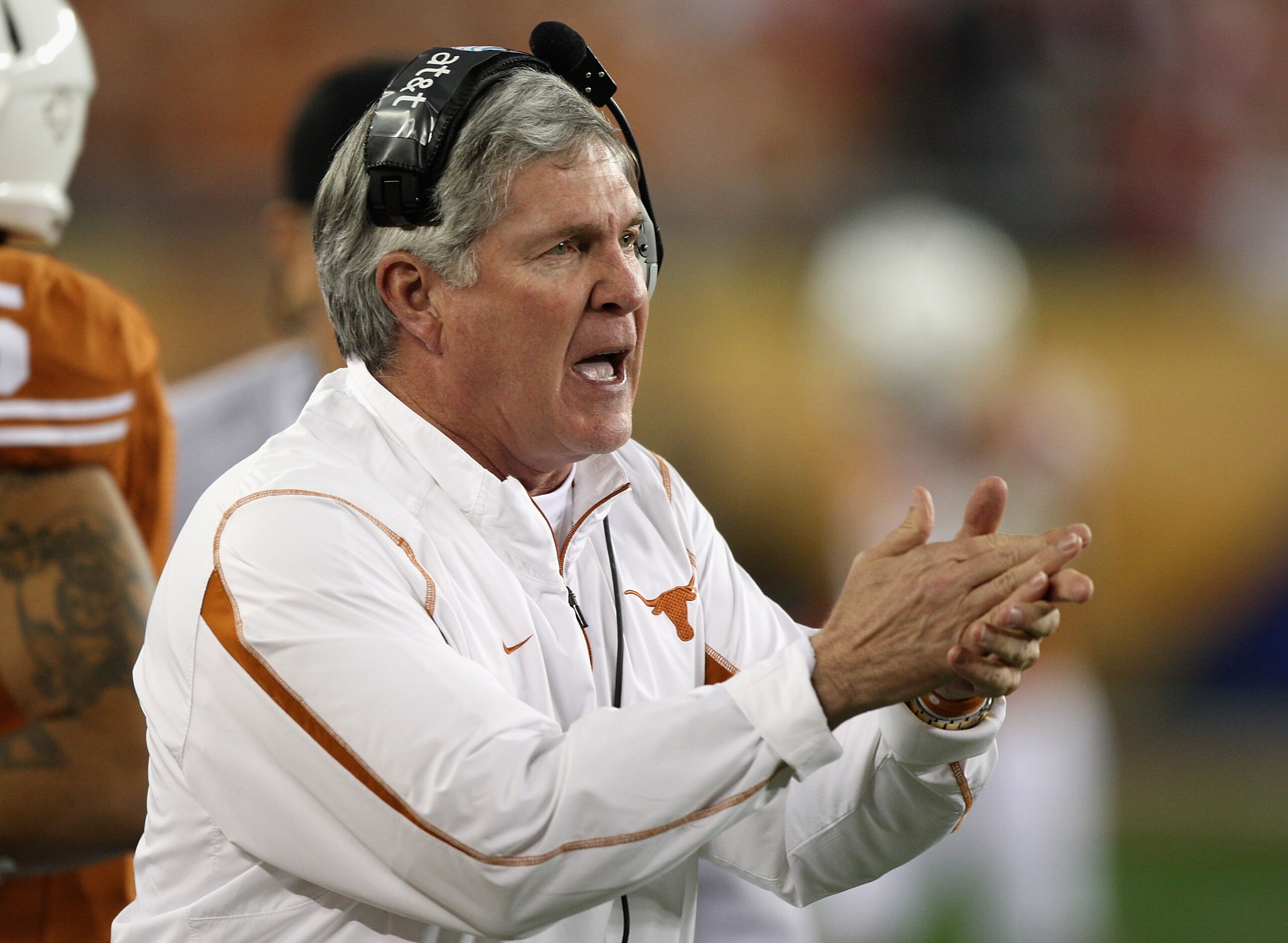 GLENDALE, AZ - JANUARY 05:  Head coach Mack Brown of the Texas Longhorns cheers his team during the Tostitos Fiesta Bowl Game against the Ohio State Buckeyes on January 5, 2009 at University of Phoenix Stadium in Glendale, Arizona.  (Photo by Jed Jacobsoh