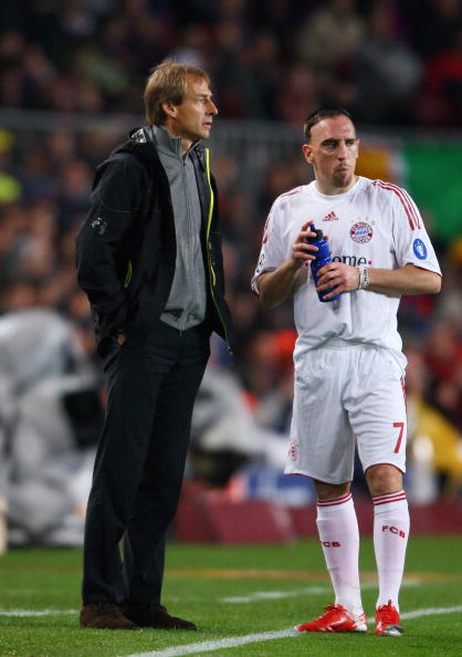 BARCELONA, SPAIN - APRIL 08:  Juergen Klinsmann and Frank Ribery of Bayern Munich look on during the UEFA Champions League quarter final first leg match between FC Barcelona and FC Bayern Munich at the Camp Nou stadium on April 8, 2009 in Barcelona, Spain