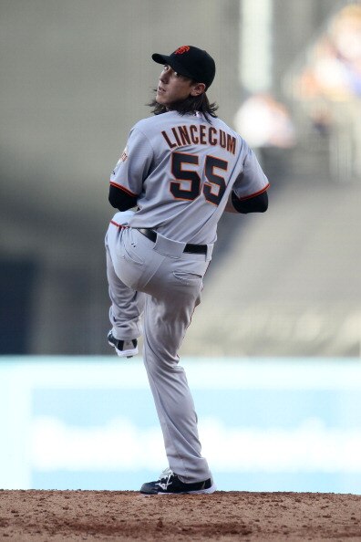 LOS ANGELES, CA - MARCH 31:  Tim Lincecum #55 of the San Francisco Giants throws a pitch against the Los Angeles Dodgers on Opening Day at Dodger Stadium on March 31, 2011 in Los Angeles, California.  (Photo by Jeff Gross/Getty Images)