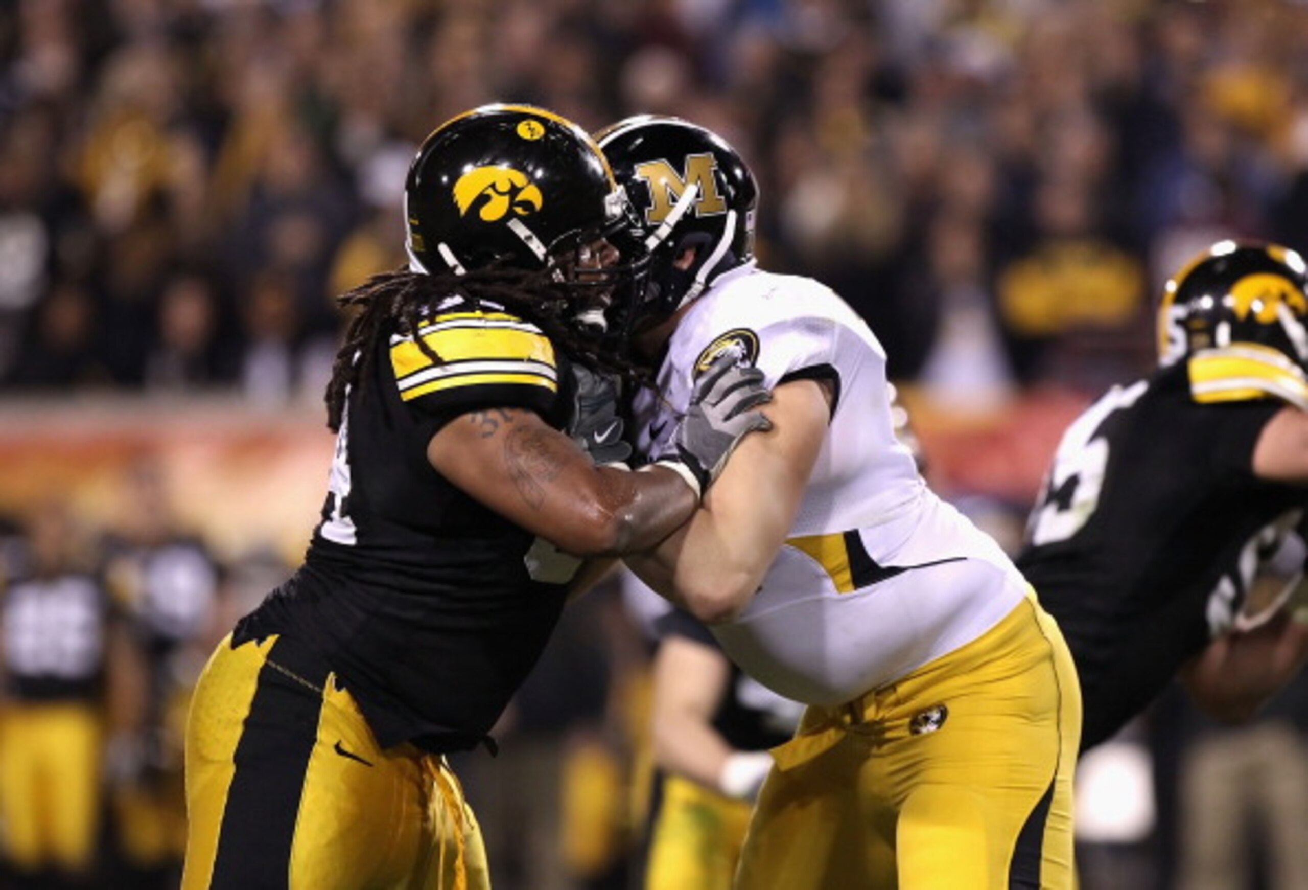 TEMPE, AZ - DECEMBER 28:  Defensive end Adrian Clayborn #94 of the Iowa Hawkeyes in action during the Insight Bowl against the Missouri Tigers at Sun Devil Stadium on December 28, 2010 in Tempe, Arizona. The Hawkeyes defeated the Tigers 27-24.  (Photo by
