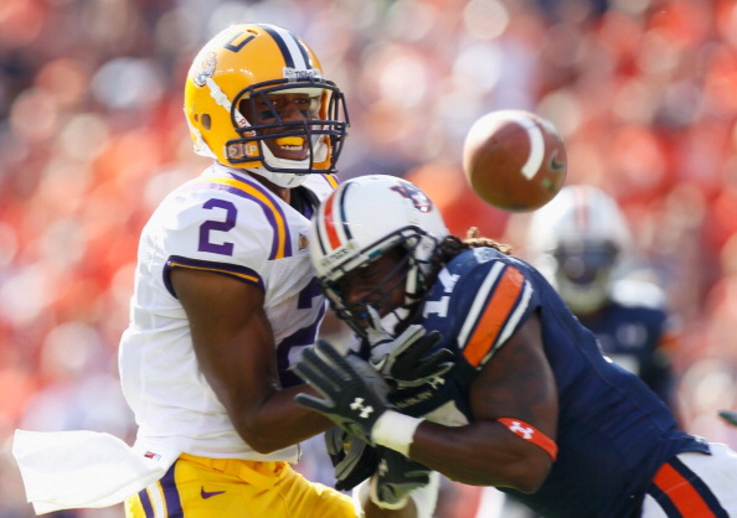 AUBURN, AL - OCTOBER 23:  Josh Bynes #17 of the Auburn Tigers forces an interception as he breaks up a pass intended for Rueben Randle #2 of the LSU Tigers at Jordan-Hare Stadium on October 23, 2010 in Auburn, Alabama.  (Photo by Kevin C. Cox/Getty Images
