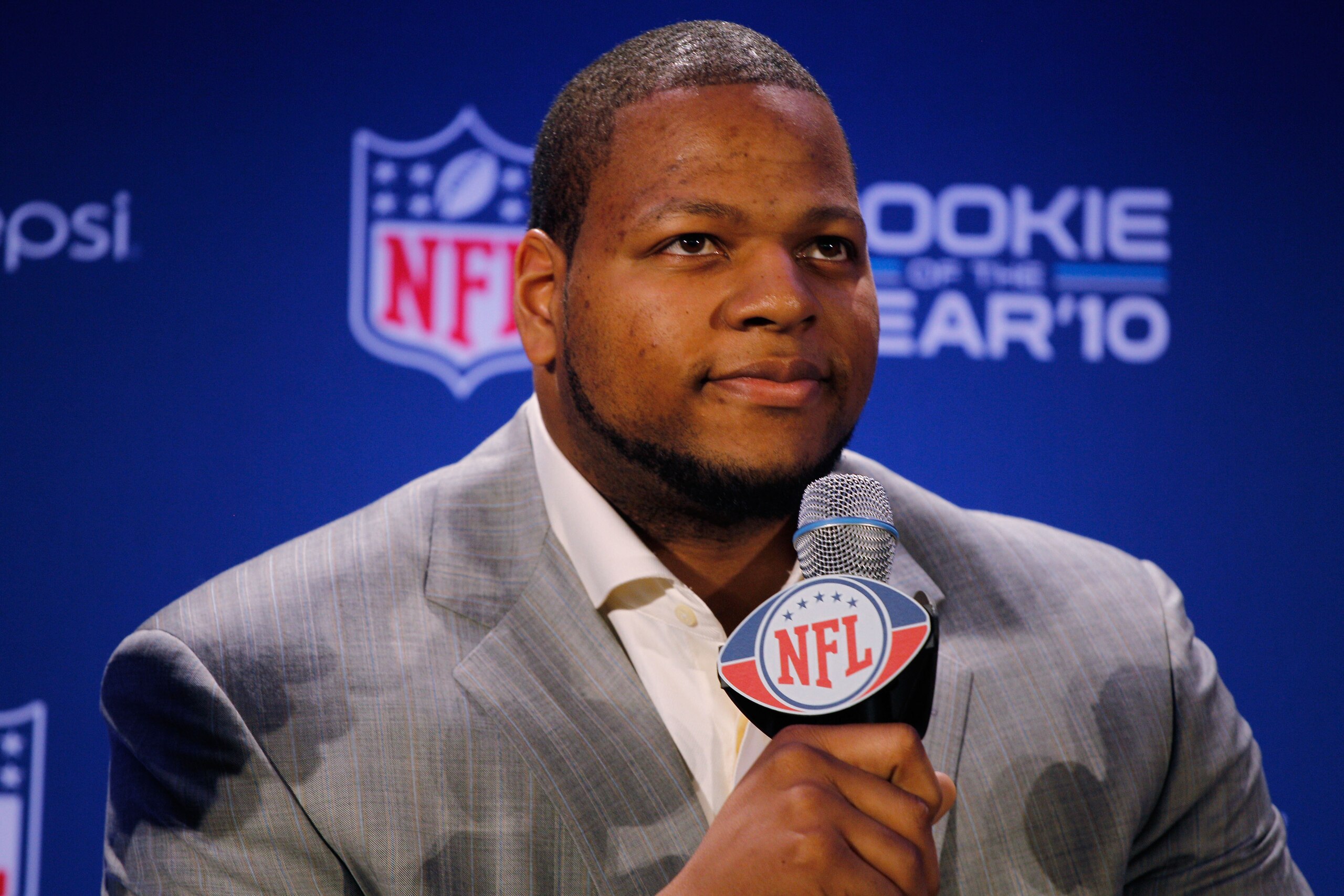 DALLAS, TX - FEBRUARY 03: Ndamukong Suh #90 of the Detroit Lions speaks during a press conference where he accepted Pepsi's 2010 NFL Rookie of the Year Award at the Super Bowl XLV media center on February 3, 2011 in Dallas, Texas. The Green Bay Packers w DALLAS, TX - FEBRUARY 03: Ndamukong Suh #90 of the Detroit Lions speaks during a press conference where he accepted Pepsi's 2010 NFL Rookie of the Year Award at the Super Bowl XLV media center on February 3, 2011 in Dallas, Texas. The Green Bay Packers w
