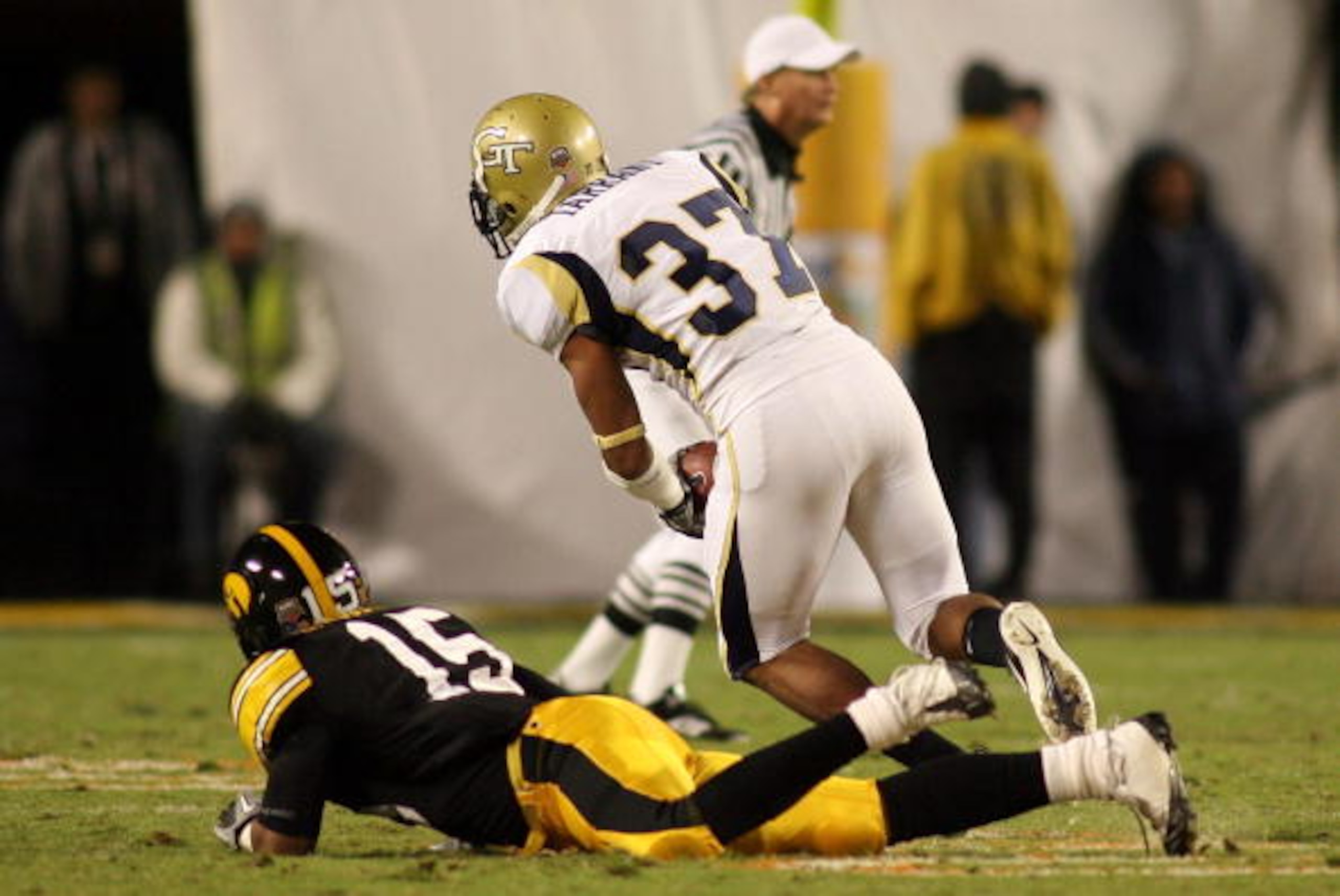 MIAMI GARDENS, FL - JANUARY 05:  Jerrard Tarrant #37 of the Georgia Tech Yellow Jackets recovers a fumble against the Iowa Hawkeyes during the FedEx Orange Bowl at Land Shark Stadium on January 5, 2010 in Miami Gardens, Florida.  (Photo by Marc Serota/Get