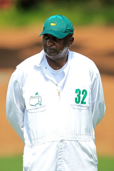 AUGUSTA, GA - APRIL 08:  Caddie Carl Jackson waits on the tenth hole during the second round of the 2011 Masters Tournament at Augusta National Golf Club on April 8, 2011 in Augusta, Georgia.  (Photo by David Cannon/Getty Images)