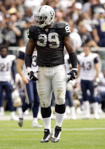 OAKLAND, CA - SEPTEMBER 19:  Lamarr Houston #99 of the Oakland Raiders in action during their game against the St. Louis Rams at the Oakland-Alameda County Coliseum on September 19, 2010 in Oakland, California.  (Photo by Ezra Shaw/Getty Images)