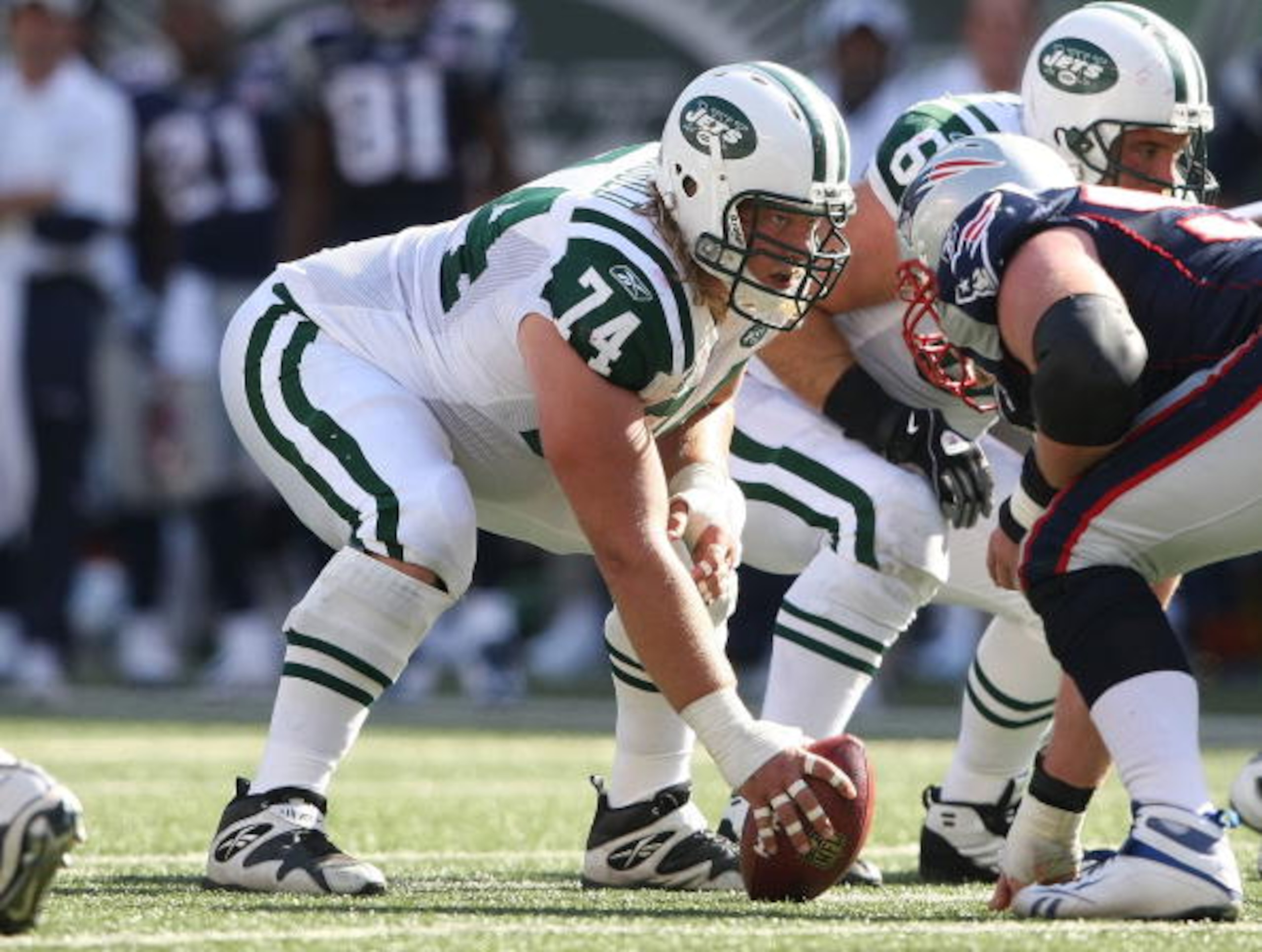 EAST RUTHERFORD, NJ - SEPTEMBER 20: Nick Mangold #74 of the New York Jets waits to snap against the New England Patriots at Giants Stadium on September 20, 2009 in East Rutherford, New Jersey. (Photo by Nick Laham/Getty Images) EAST RUTHERFORD, NJ - SEPTEMBER 20: Nick Mangold #74 of the New York Jets waits to snap against the New England Patriots at Giants Stadium on September 20, 2009 in East Rutherford, New Jersey. (Photo by Nick Laham/Getty Images)