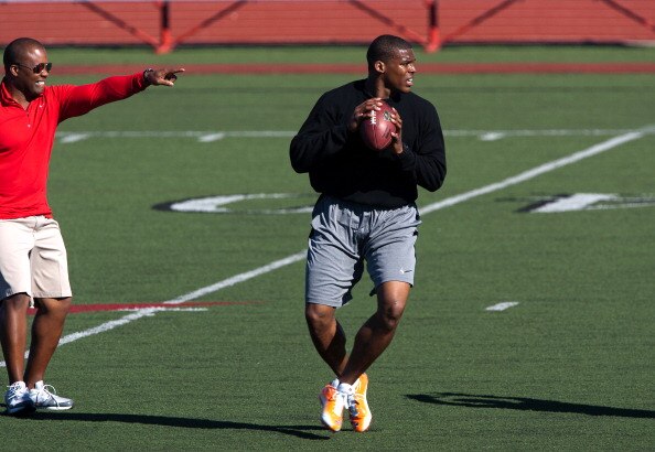 SAN DIEGO, CA - FEBRUARY 10: 2010 Heisman Trophy winning quarterback Cam Newton of Auburn throws the ball during his workout routine for the media at Cathedral High School's sports stadium on February 10, 2011 in San Diego, California. (Photo by Kent Horn