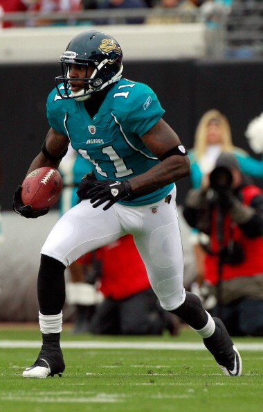 JACKSONVILLE, FL - DECEMBER 26:  Mike Sims-Walker #11 of the Jacksonville Jaguars runs after making a reception during the game against the Washington Redskins at EverBank Field on December 26, 2010 in Jacksonville, Florida.  (Photo by Sam Greenwood/Getty