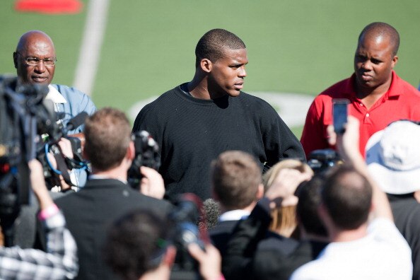 SAN DIEGO, CA - FEBRUARY 10: 2010 Heisman Trophy winning quarterback Cam Newton of Auburn answers questions after his workout routine for the media at Cathedral High School's sports stadium on February 10, 2011 in San Diego, California. (Photo by Kent Hor