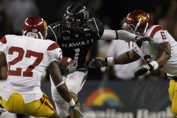 HONOLULU - SEPTEMBER 2:  Greg Salas of the University of Hawaii Warriors runs the ball during second half action at Aloha Stadium September 2, 2010 in Honolulu, Hawaii. (Photo by Kent Nishimura/Getty Images)