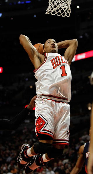 CHICAGO - MARCH 01: Derrick Rose #1 of the Chicago Bulls goes up for a dunk against the Atlanta Hawks at the United Center on March 1, 2010 in Chicago, Illinois. The Hawks defeated the Bulls 116-92. NOTE TO USER: User expressly acknowledges and agrees tha