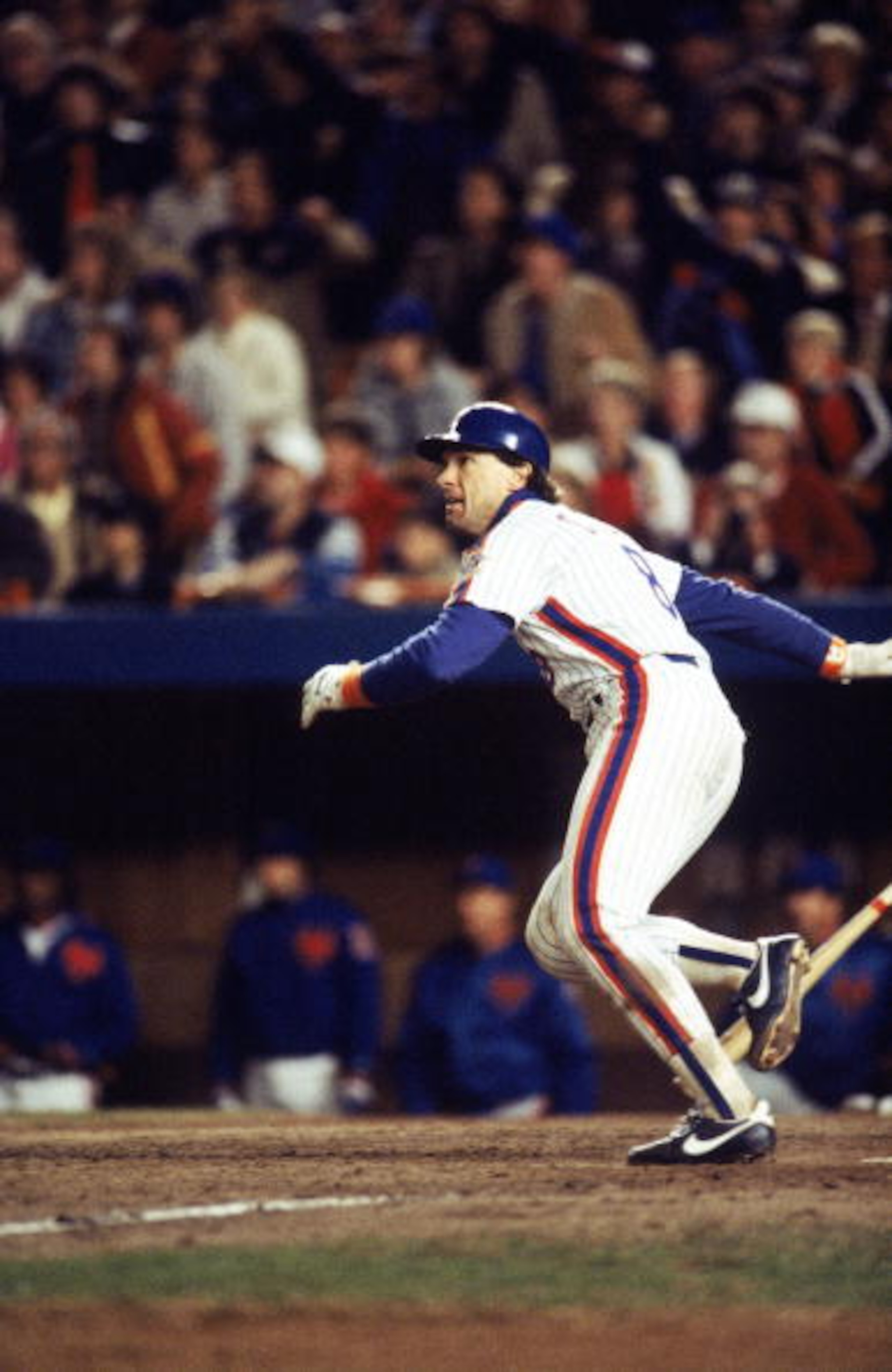FLUSHING, NY - OCTOBER 27:  Gary Carter #8 of the New York Mets runs to first base during Game seven of the 1986 World Series against the Boston Red Sox at Shea Stadium on October 27, 1986 in Flushing, New York. The Mets defeated the Red Sox 8-5 to win th