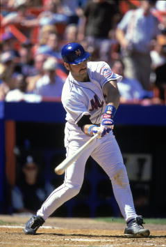17 Aug 2000:  Catcher Mike Piazza #31 of the New York Mets takes a swing at the ball during the game against the Colorado Rockies at Shea Stadium in Flushing, New York. The Mets defeated the Rockies 2-1.Mandatory Credit: Jamie Squire  /Allsport