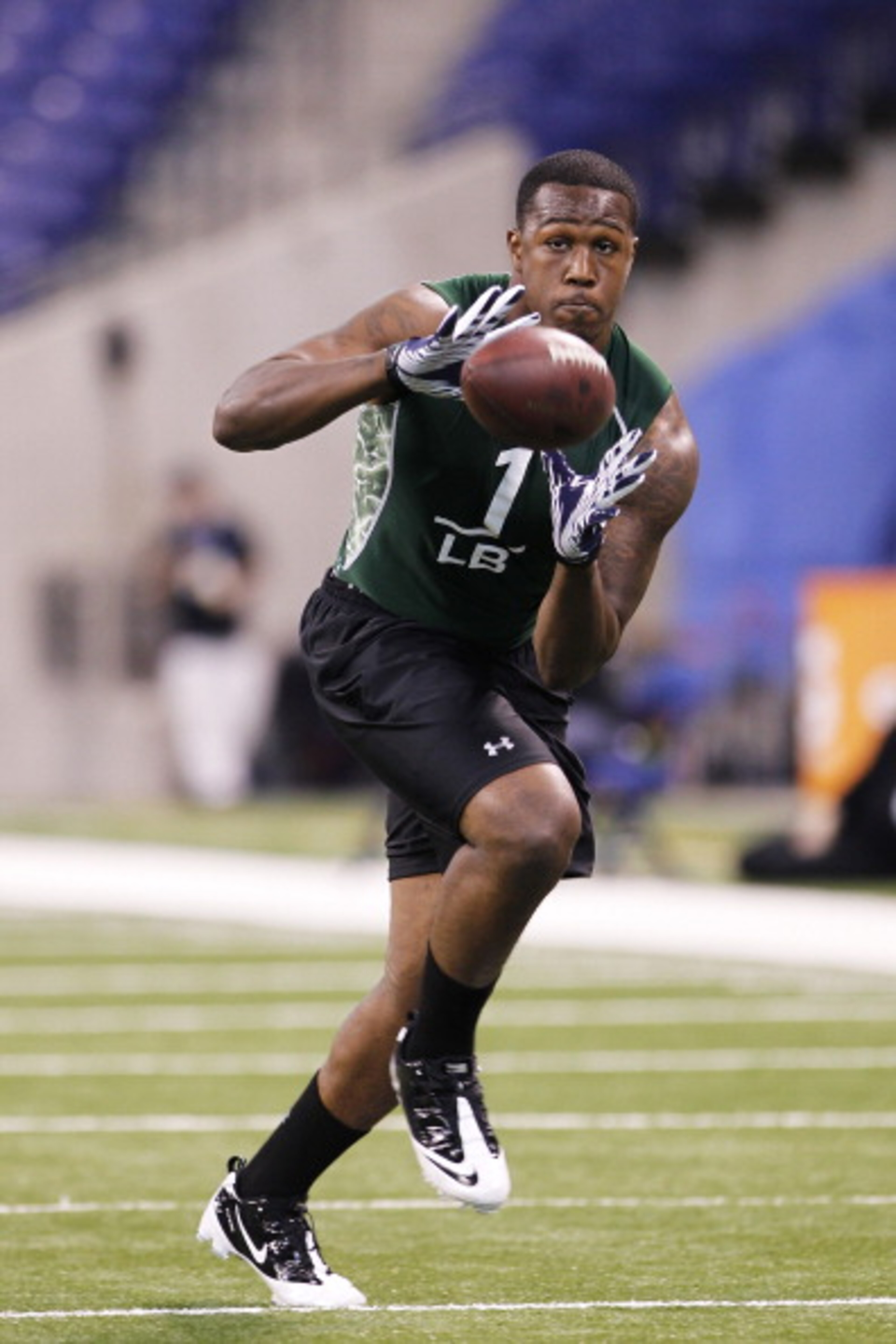 INDIANAPOLIS, IN - FEBRUARY 28: Akeem Ayers of UCLA works out during the 2011 NFL Scouting Combine at Lucas Oil Stadium on February 28, 2011 in Indianapolis, Indiana. (Photo by Joe Robbins/Getty Images) INDIANAPOLIS, IN - FEBRUARY 28: Akeem Ayers of UCLA works out during the 2011 NFL Scouting Combine at Lucas Oil Stadium on February 28, 2011 in Indianapolis, Indiana. (Photo by Joe Robbins/Getty Images)