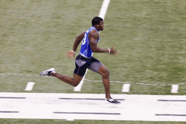 INDIANAPOLIS, IN - MARCH 1: Defensive back Aaron Williams #53 runs the 40-yard dash during the 2011 NFL Scouting Combine at Lucas Oil Stadium on February 28, 2011 in Indianapolis, Indiana. (Photo by Joe Robbins/Getty Images)