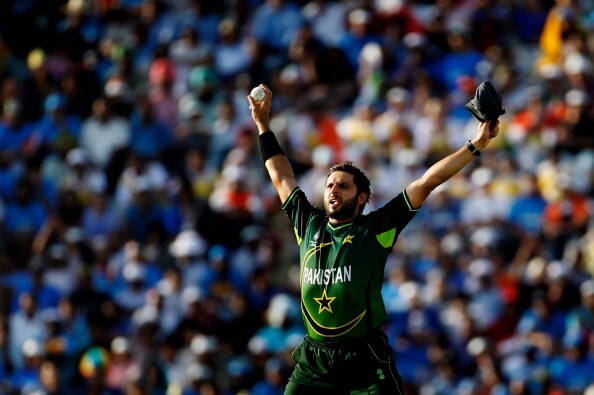 MOHALI, INDIA - MARCH 30: Captain Shahid Afridi of Pakistan celebrates after taking the catch to dismiss Sachin Tendulkar of India off the bowling of Saeed Ajmal of Pakistan during the 2011 ICC World Cup second Semi-Final between India and Pakistan at Pun