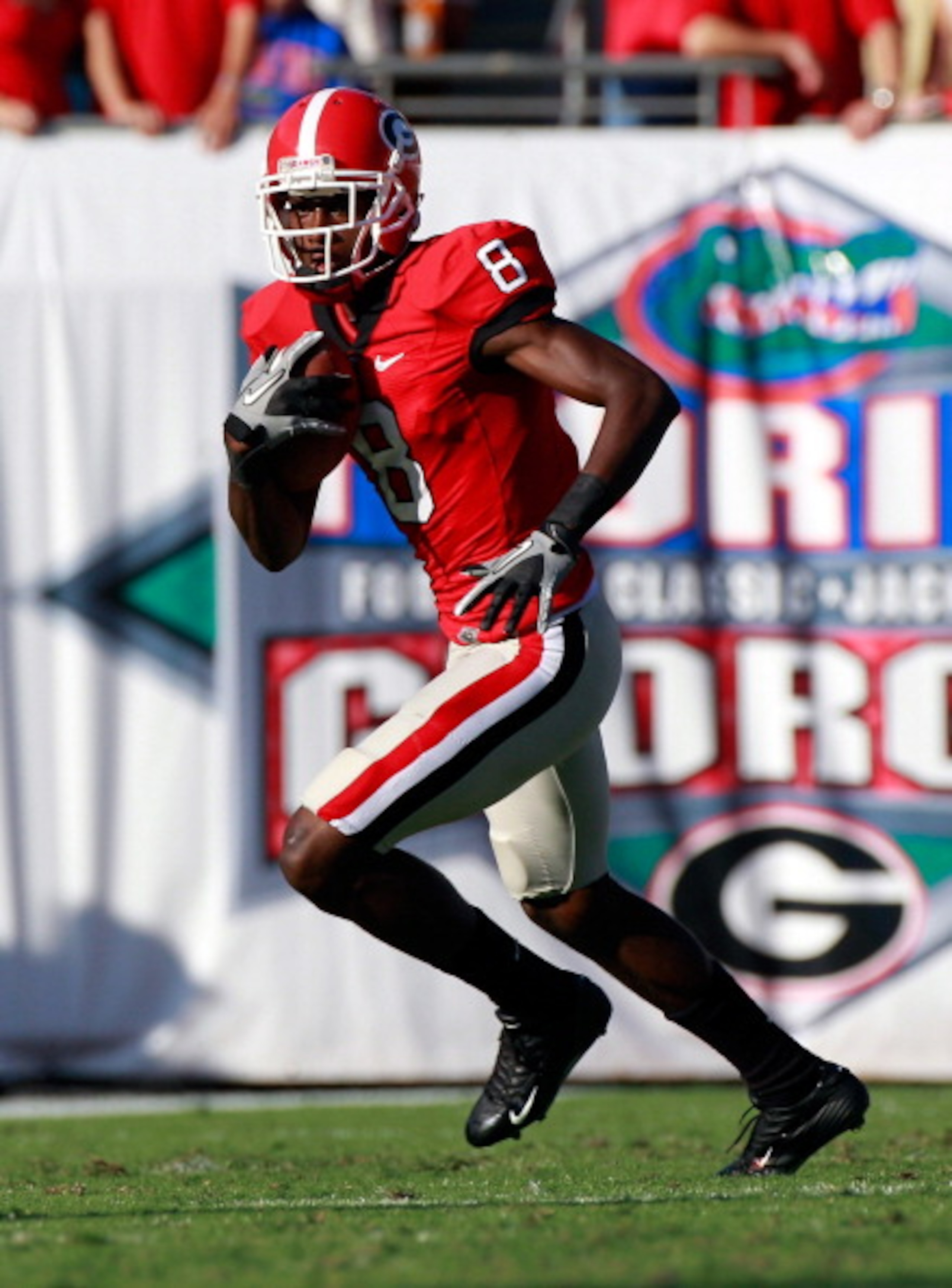 JACKSONVILLE, FL - OCTOBER 30:  A.J. Green #8 of the Georgia Bulldogs runs for yardage during the game against the Florida Gators at EverBank Field on October 30, 2010 in Jacksonville, Florida.  (Photo by Sam Greenwood/Getty Images)