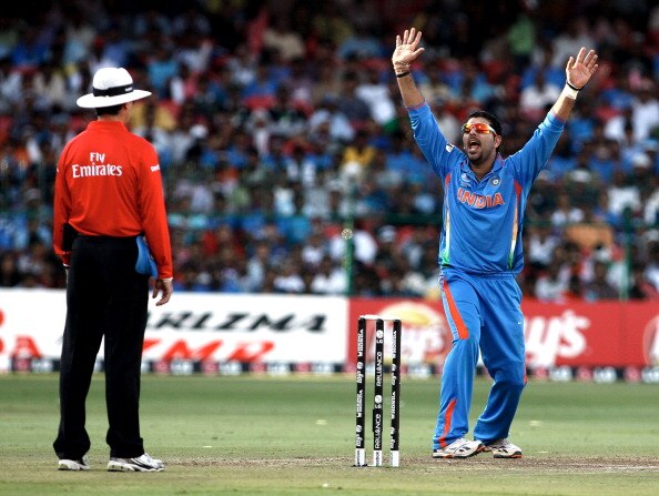 BANGALORE, INDIA - MARCH 06: Yuvraj Singh of India appeals successfully for LBW against John Mooney of Ireland in the Group B - 2011 ICC World Cup match between India and Ireland at M. Chinnaswamy Stadium on March 6, 2011 in Bangalore, India.  (Photo by G