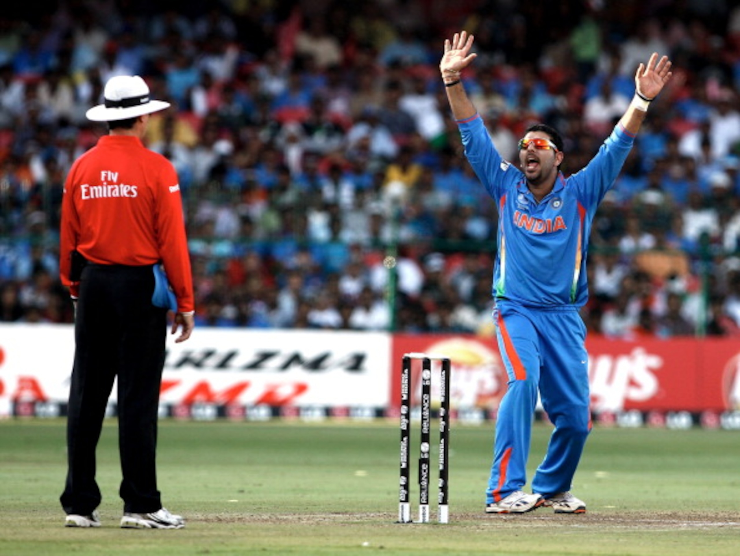 BANGALORE, INDIA - MARCH 06: Yuvraj Singh of India appeals successfully for LBW against John Mooney of Ireland in the Group B - 2011 ICC World Cup match between India and Ireland at M. Chinnaswamy Stadium on March 6, 2011 in Bangalore, India.  (Photo by G