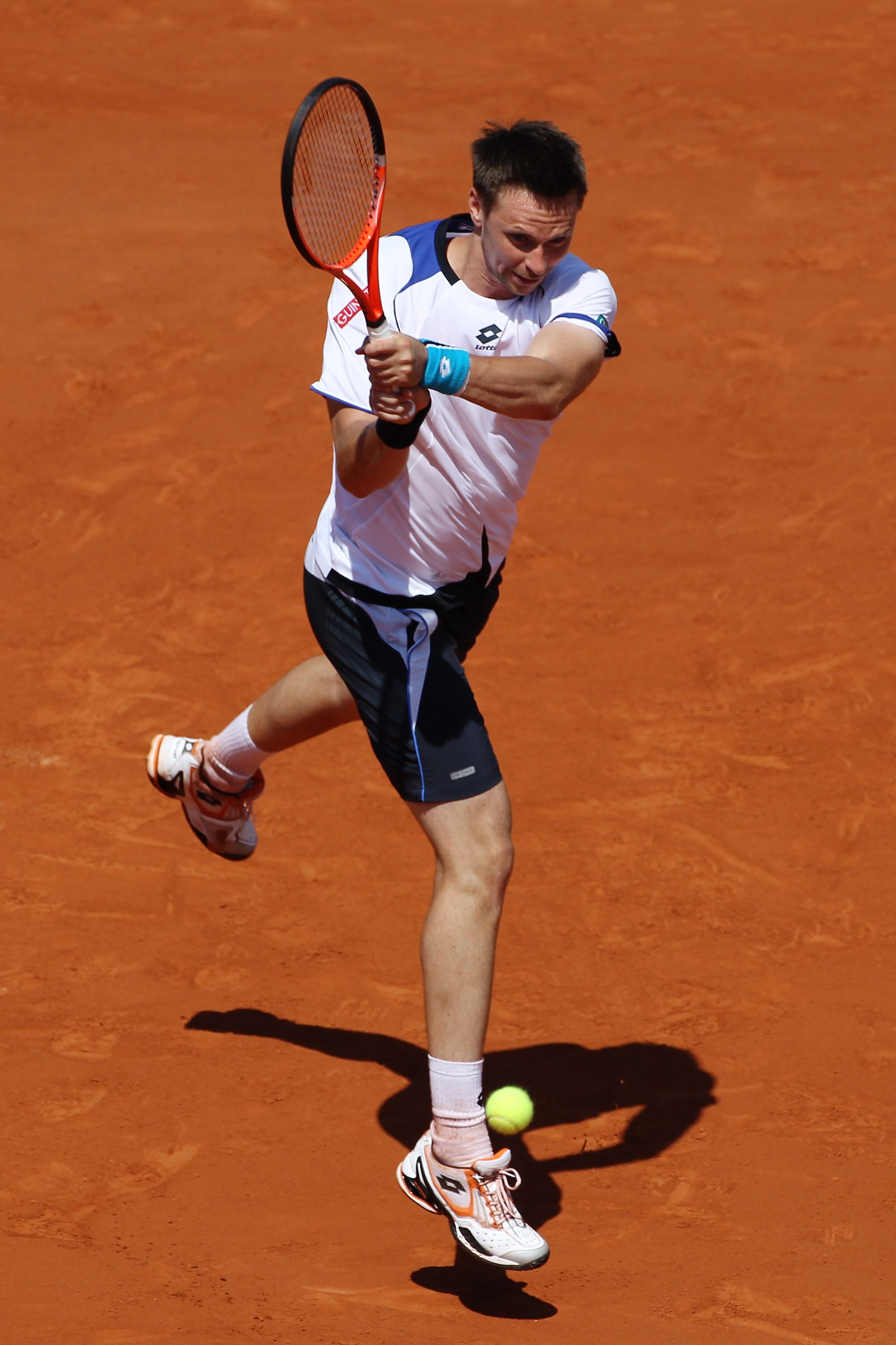 PARIS - JUNE 04:  Robin Soderling of Sweden plays a backhand during the men's singles semi final match between Robin Soderling of Sweden and Tomas Berdych of Czech Republic at the French Open on day thirteen of the French Open at Roland Garros on June 4,