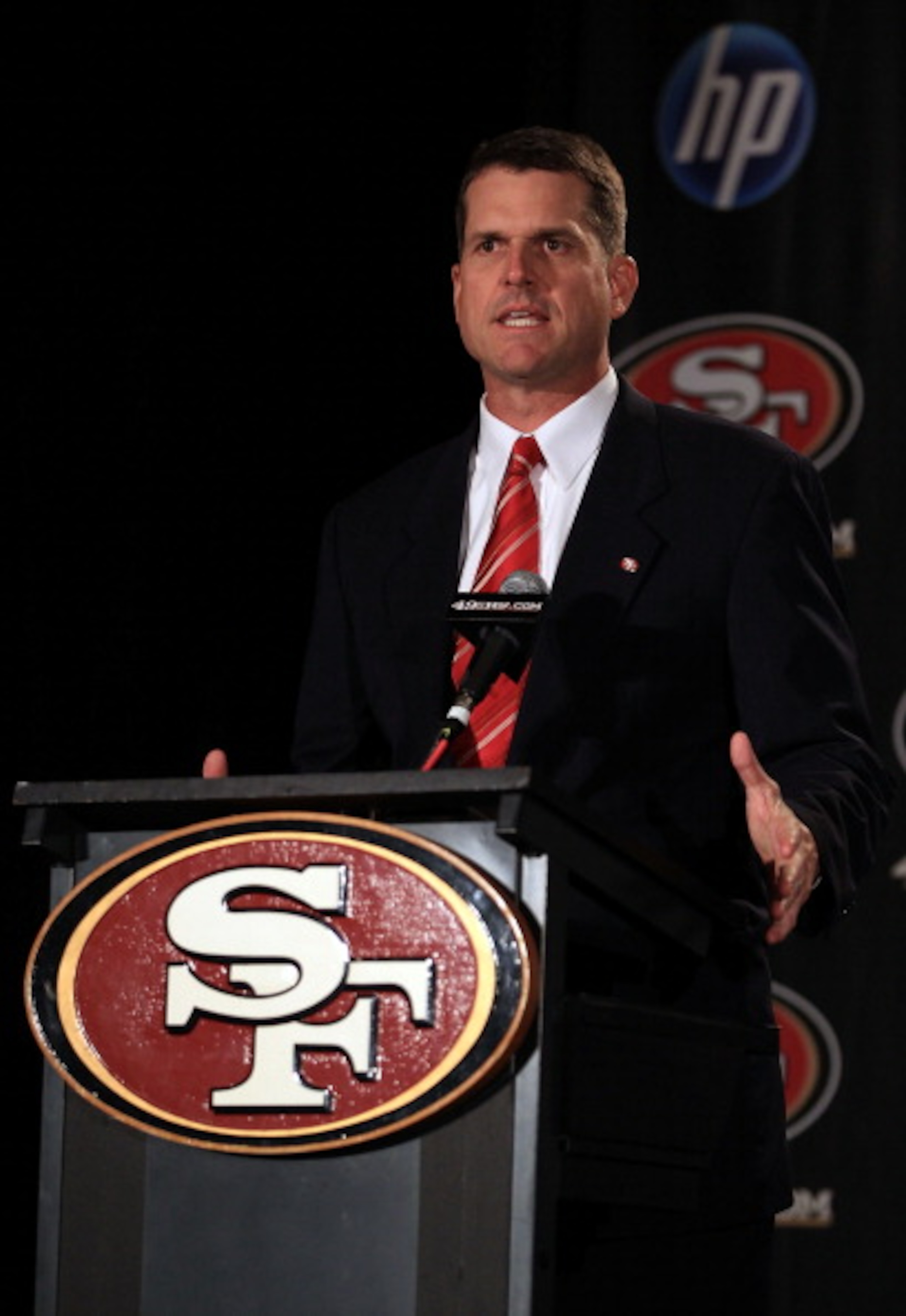 SAN FRANCISCO, CA - JANUARY 07:  Jim Harbaugh speaks at a press conference where he was introduced as the new San Francisco 49ers head coach at the Palace Hotel on January 7, 2011 in San Francisco, California.  (Photo by Ezra Shaw/Getty Images)