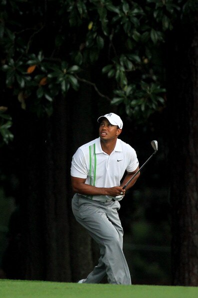 AUGUSTA, GA - APRIL 08:  Tiger Woods watches his second shot on the 18th hole during the second round of the 2011 Masters Tournament at Augusta National Golf Club on April 8, 2011 in Augusta, Georgia.  (Photo by David Cannon/Getty Images)