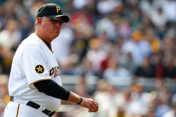 PITTSBURGH - APRIL 07:  Manager Clint Hurdle #13 of the Pittsburgh Pirates walks off of the field after pulling Paul Maholm #28 against the Colorado Rockies during the Opening Day game on April 7, 2011 at PNC Park in Pittsburgh, Pennsylvania.  (Photo by J