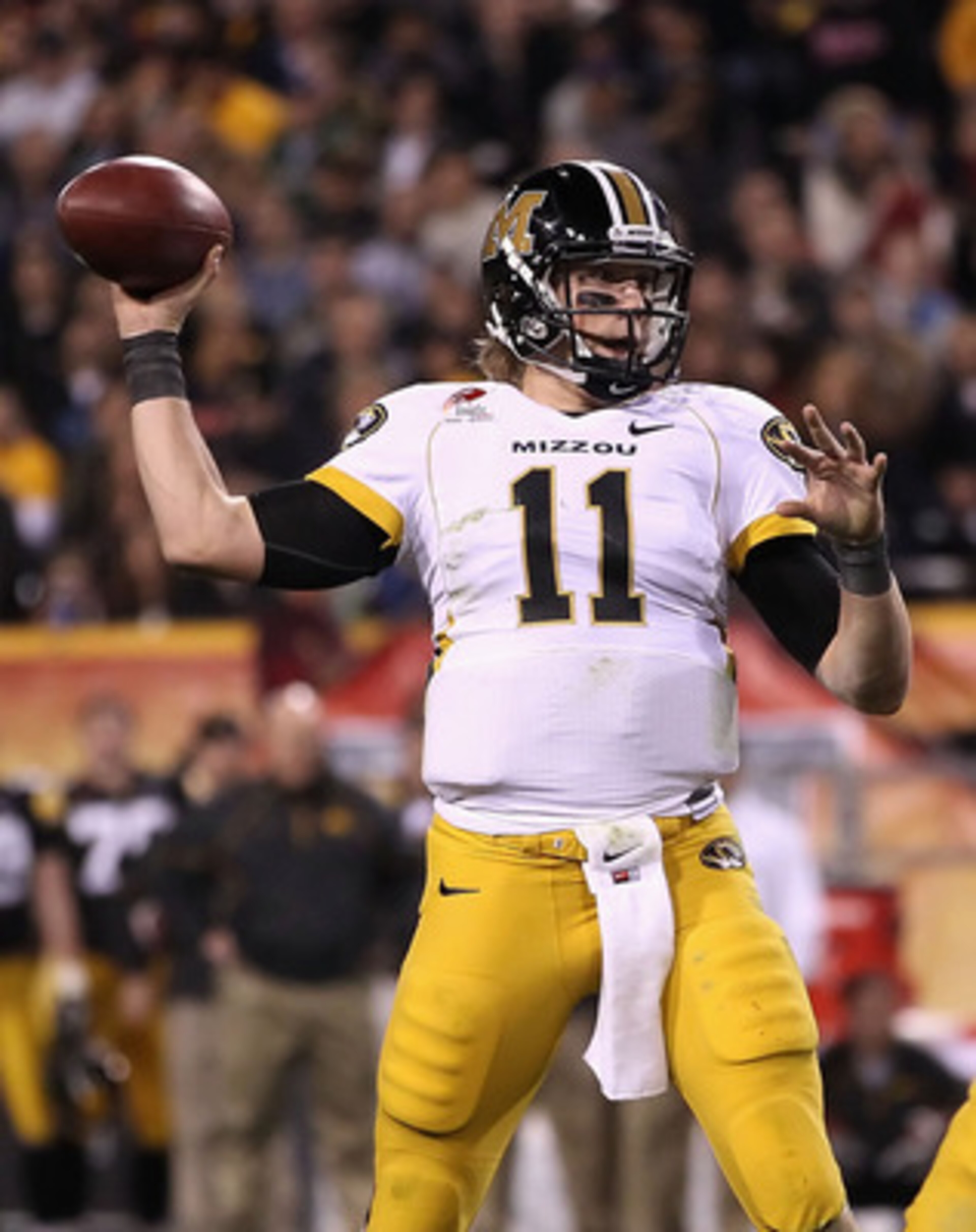 TEMPE, AZ - DECEMBER 28: Quarterback Blaine Gabbert #11 of the Missouri Tigers drops back to pass during the Insight Bowl against the Iowa Hawkeyes at Sun Devil Stadium on December 28, 2010 in Tempe, Arizona. The Hawkeyes defeated the Tigers 27-24. (P TEMPE, AZ - DECEMBER 28: Quarterback Blaine Gabbert #11 of the Missouri Tigers drops back to pass during the Insight Bowl against the Iowa Hawkeyes at Sun Devil Stadium on December 28, 2010 in Tempe, Arizona. The Hawkeyes defeated the Tigers 27-24. (P