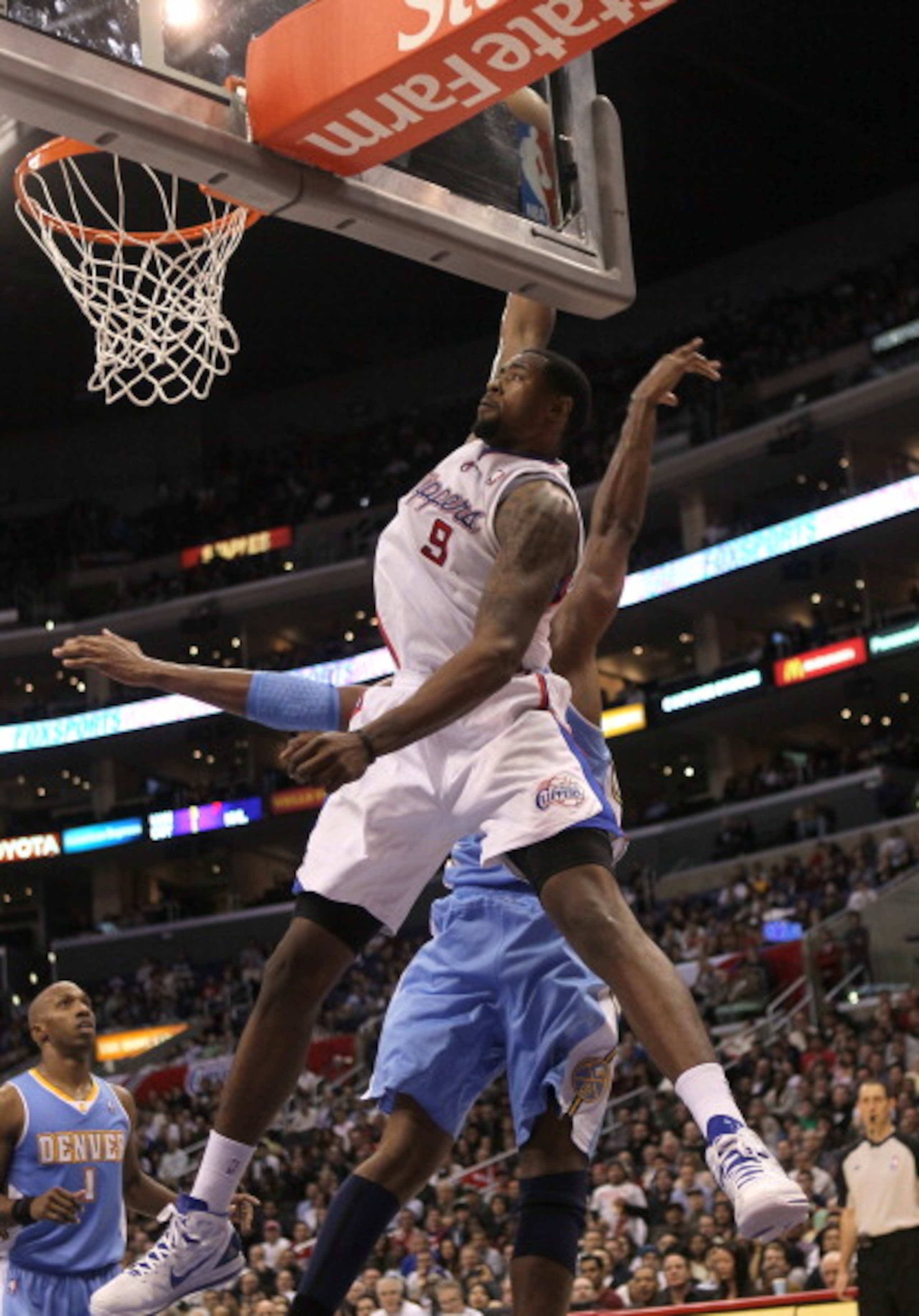 LOS ANGELES, CA - JANUARY 5:  DeAndre Jordan #9 of the Los Angeles Clippers makes an alley oop dunk against the Denver Nuggets at Staples Center on January 5, 2011  in Los Angeles, California. The Clippers won 106-93.  NOTE TO USER: User expressly acknowl