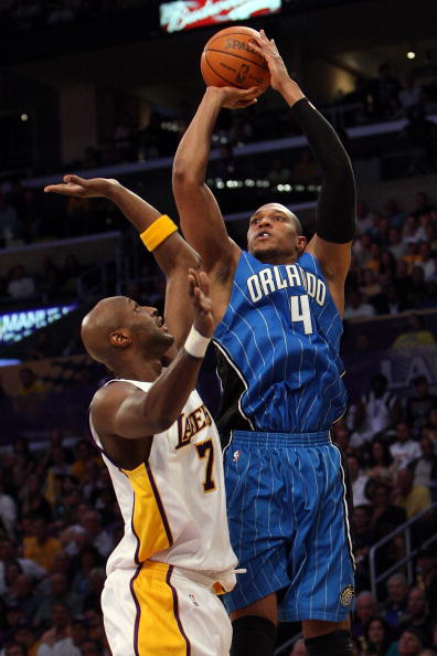 LOS ANGELES, CA - JUNE 07:  Tony Battie #4 of the Orlando Magic shoots over Lamar Odom #7 of the Los Angeles Lakers in the first half of Game Two of the 2009 NBA Finals at Staples Center on June 7, 2009 in Los Angeles, California. NOTE TO USER: User expre