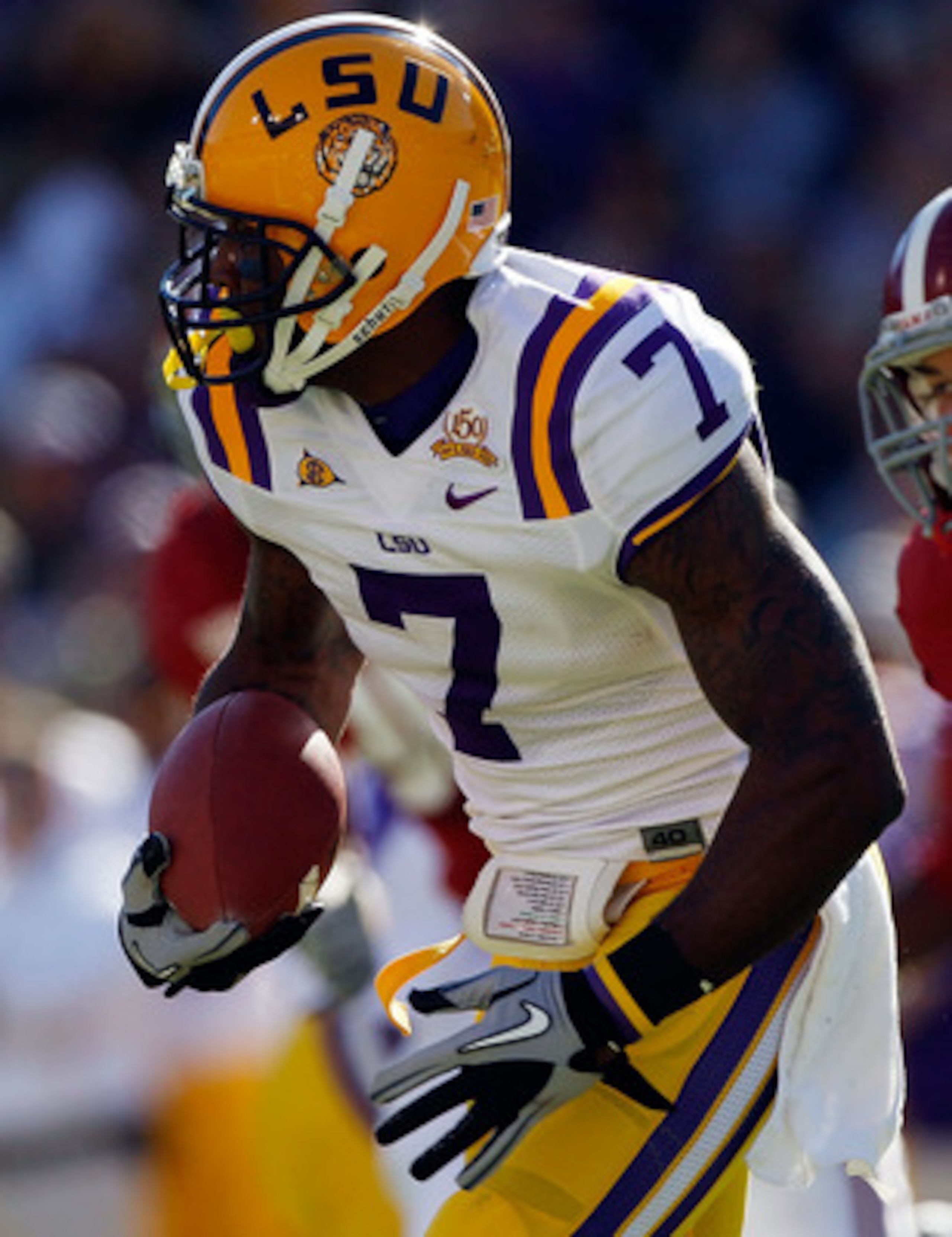 BATON ROUGE, LA - NOVEMBER 06:  Patrick Peterson #7 of the Louisiana State University Tigers avoids a tackle by Brad Smelley #17 of the Alabama Crimson Tide  at Tiger Stadium on November 6, 2010 in Baton Rouge, Louisiana.  (Photo by Chris Graythen/Getty I