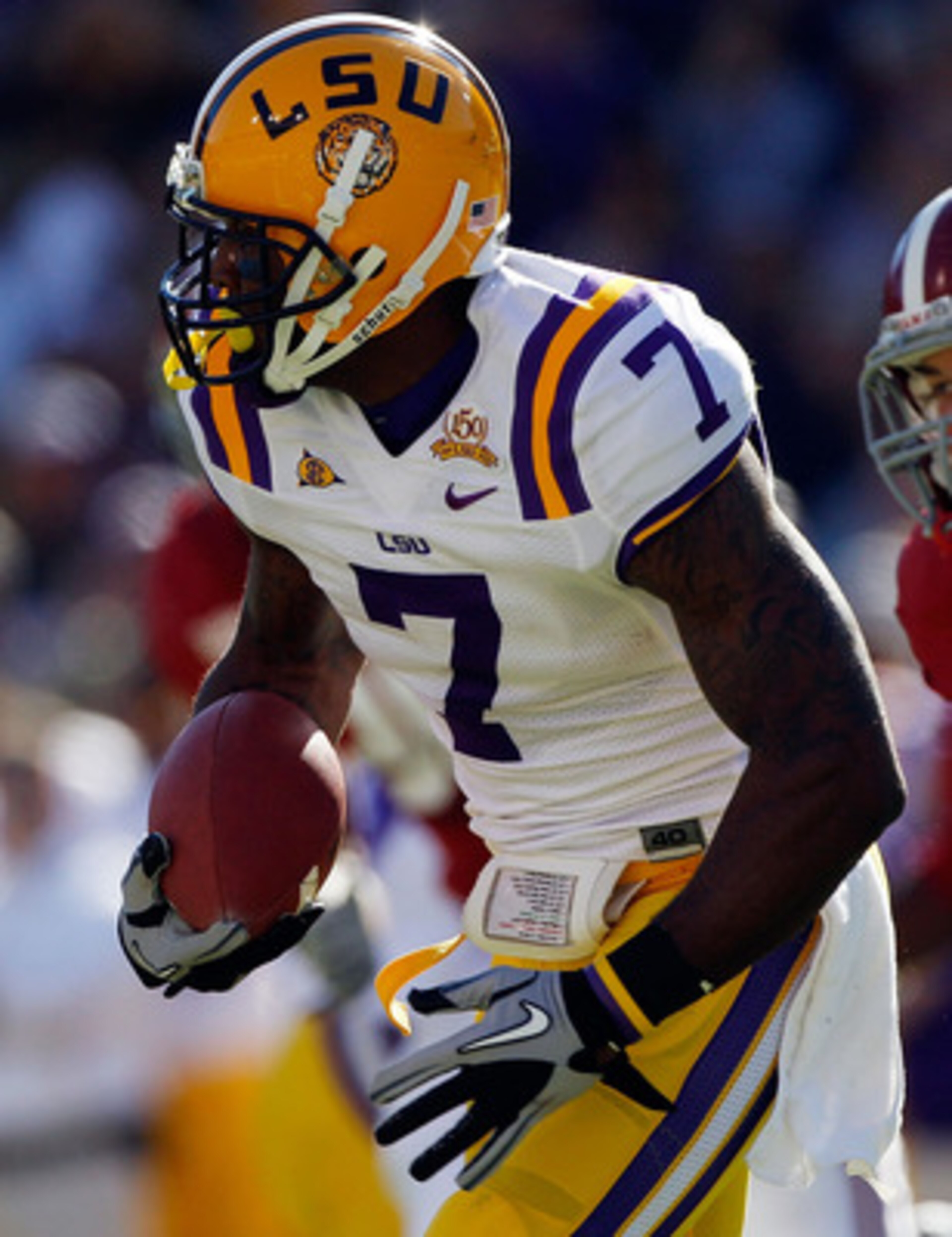 BATON ROUGE, LA - NOVEMBER 06: Patrick Peterson #7 of the Louisiana State University Tigers avoids a tackle by Brad Smelley #17 of the Alabama Crimson Tide at Tiger Stadium on November 6, 2010 in Baton Rouge, Louisiana. (Photo by Chris Graythen/Getty I BATON ROUGE, LA - NOVEMBER 06: Patrick Peterson #7 of the Louisiana State University Tigers avoids a tackle by Brad Smelley #17 of the Alabama Crimson Tide at Tiger Stadium on November 6, 2010 in Baton Rouge, Louisiana. (Photo by Chris Graythen/Getty I