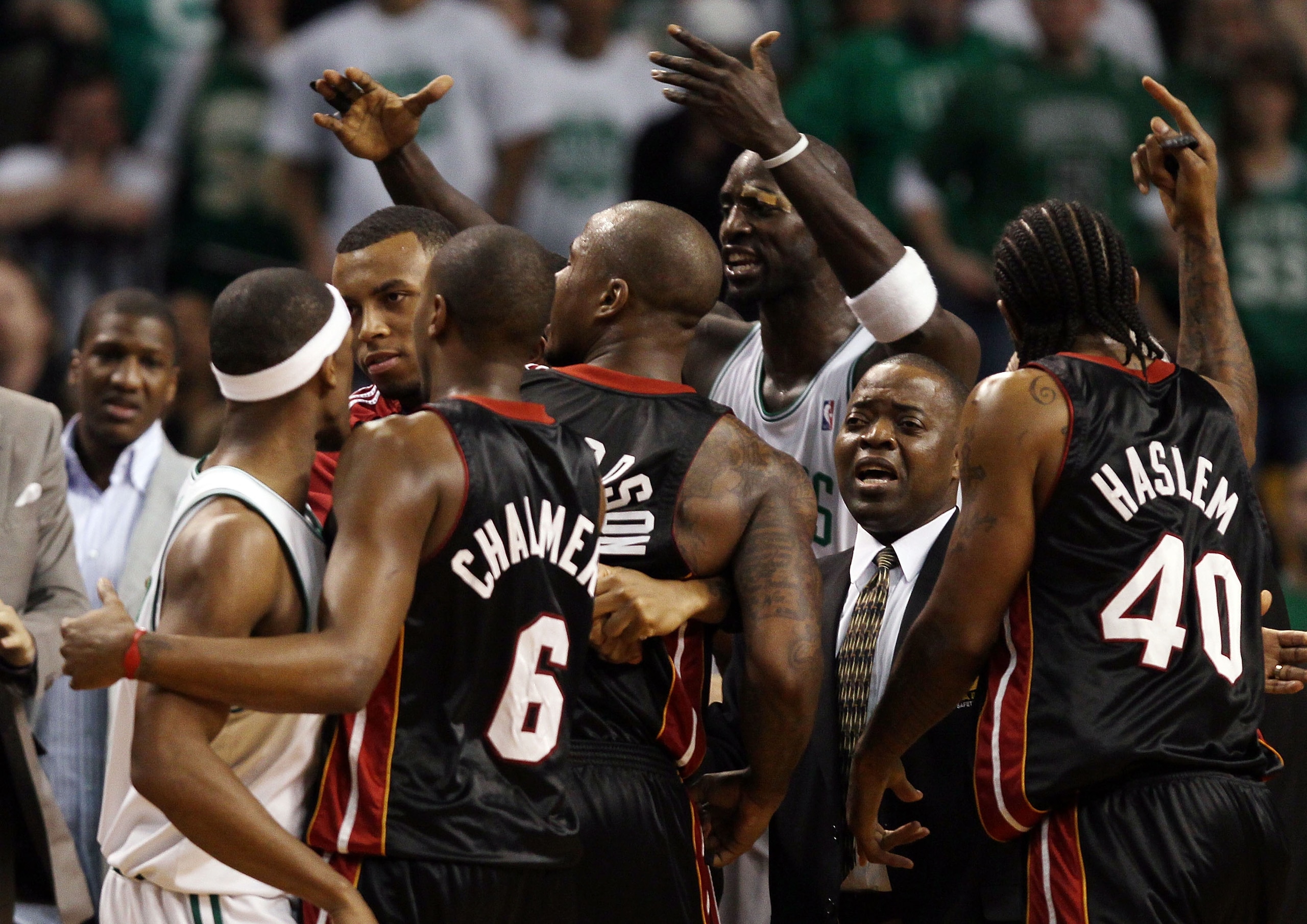 BOSTON - APRIL 17:  Rajon Rondo #9 and Kevin Garnett #5 of the Boston Celtics get into it with Quentin Richardson #5, Udonis Haslem #40 and Mario Chalmers #6 of the Miami Heat during Game One of the Eastern Conference Quarterfinals of the 2010 NBA playoff